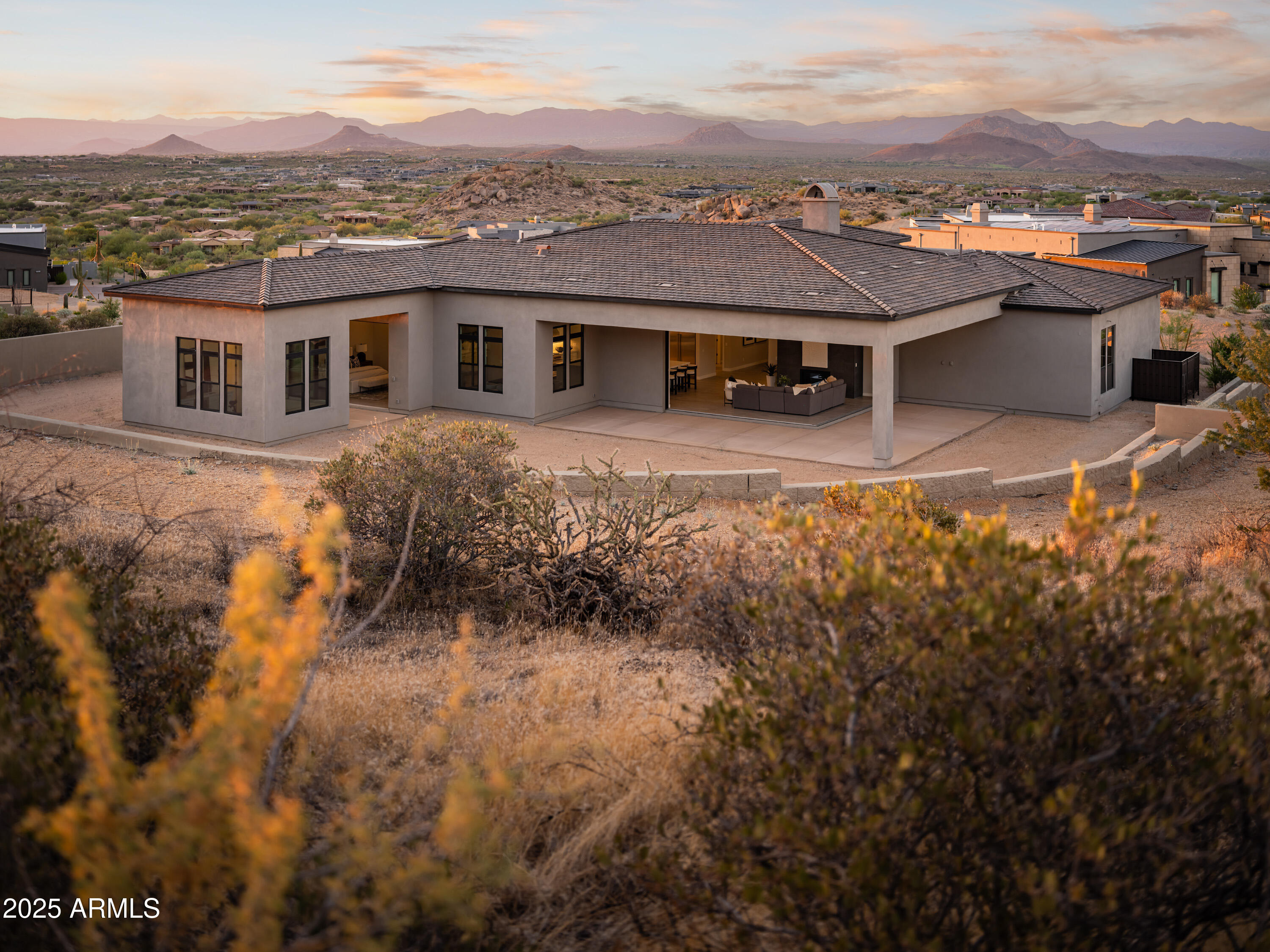 Don't miss this opportunity to live in Scottsdale's most desirable location, the picturesque, and award winning community of Sereno Canyon. Nestled against the McDowell Mountain preserve, with Sonoran desert views and close proximity to hiking trails. This open floorplan includes a casita with an exterior and interior entry, wet bar, and has enough room for bedroom and living space. The kitchen great room opens to a large covered patio with a 20' 90 degree corner door that pockets into the wall and brings the outside in. Chefs kitchen including two quartz islands for entertaining, SS Wolf Pro Line including a 48'' smart range, wall oven, and Sub-Zero 48'' side by side built refrigerator. 14' ceilings in the main living area. All bedrooms are en-suite with WIC.
10 year warranty included.
