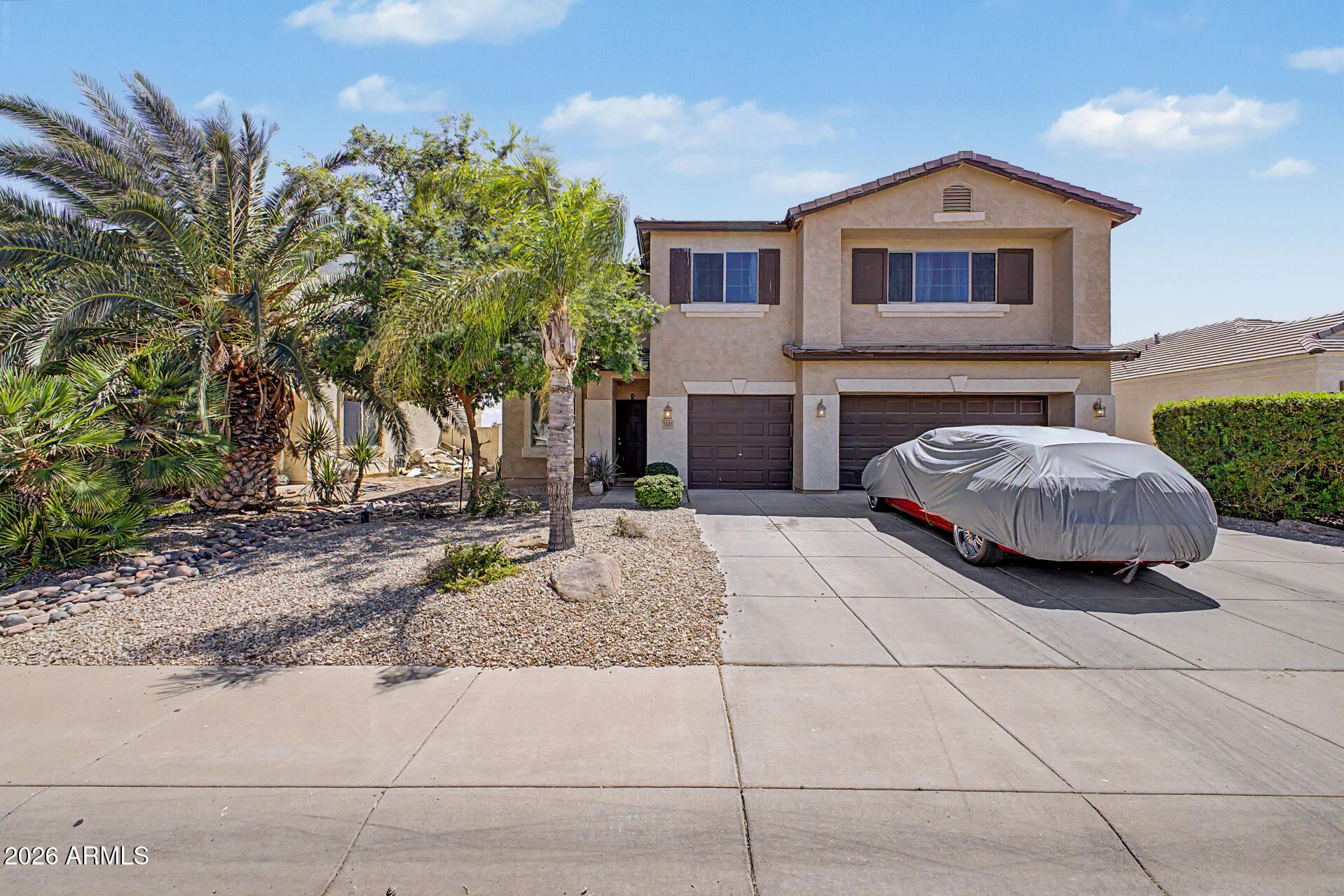 Check out this charming two-story home in Magma Ranch! Great curb appeal, featuring a manicured landscape and a 2-car garage. Inside, you'll find sizable living spaces designed with comfort in mind, showcasing carpeting underfoot, tile in high-traffic areas, an earthy palette that creates a welcoming ambiance, and a fireplace to ensure cozy winter evenings. The kitchen displays oak cabinetry adorned with crown molding, granite countertops with a matching backsplash, a walk-in pantry, SS appliances, and an island, perfect for quick meals and casual conversations. Relax after a long day in the main bedroom, complete with a walk-in closet for effortless organization and a bathroom with dual sinks and a separate shower & tub. Spacious loft and den offering flexibility for a home office, TV area, or quiet retreat. Out back, you'll have a cozy covered patio ideal for morning coffee, and ample space for outdoor relaxation. Hurry up, this gem won't last!