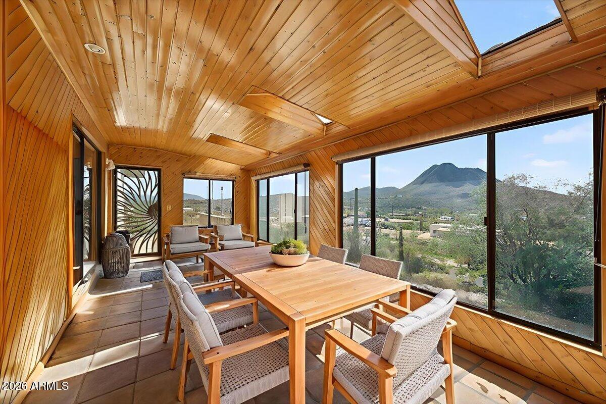 2 HOMES under 1 ROOF. An EXCEPTIONAL & TRULY RARE offering 2.6-acre elevated New River Estate. The main residence features 3 bed, 2 baths, Office,  Basement, Storage rm & ARIZONA rm. Attached 3 bed, 2 bath GUEST QUARTERS w/FULL Kitchen. Perfect Multi Generational living, Guest HSE or RENTAL Income $$. Property backs to 15 acres of State Trust land + 71-acres of BLM + 73,200 acres State Trust! For an ''ENDLESS BACKYARD. Detached 25x32 3-car GARAGE/WORKSHOP, LUSH GARDEN w Fruit trees, 3000 gallon underground water storage connected to shared well.  New Roof on entire home + fresh interior/exterior paint.  All of this for $215 per sq ft. A rare opportunity unlike anything you will find!
Would make a great VBRO/AirB&B vacation property, huge circle drive, No HOA, access to lots of jeep trails