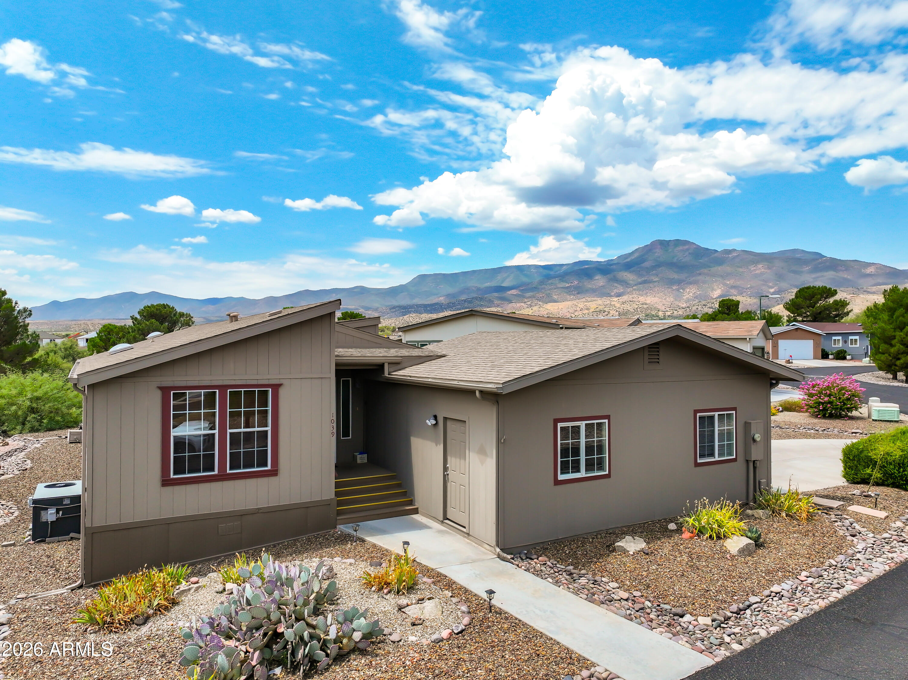 Enjoy yourself on a deck with views of the golf course and Mingus Mountain Views, located on the 8th Fairway, private setting, Large eat-in kitchen, Breakfast bar & Island, Built-in electric fireplace with bookshelf, oversized 2 car garage with side entrance, Newer Water Softener, split floor plan, screen door, pleated shades on most windows, Roman Shades & wooden blinds, skylights, water softener, Clerestory Windows, Ceilings fans, easy to see!