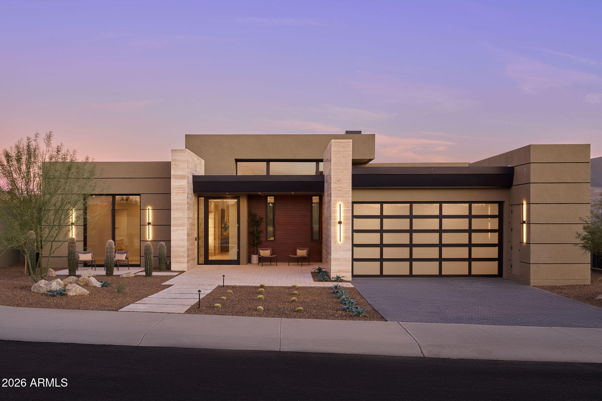 This newly completed Serene Model B has 3,290/sf and has been highly upgraded by EST EST designers with lavish interior finishes including Travertine tiled walls, double sided see through fireplace, double island kitchen, wood flooring throughout, white oak tongue and groove ceiling in the Great room and primary suite, posh primary suite with spa like bath and Appliances by Sub-Zero, & Wolf. The backyard includes a stunning pool and BBQ.  Also included is a 3 car tandem garage, fully landscaped yard. Serene is Located on the North East side of Pinnacle Peak Mountain in North Scottsdale, Serene is close to  shopping, restaurants and over two dozen private and public golf courses. Don't miss your opportunity to take part in the Serene lifestyle. Photo shown are of different house same model