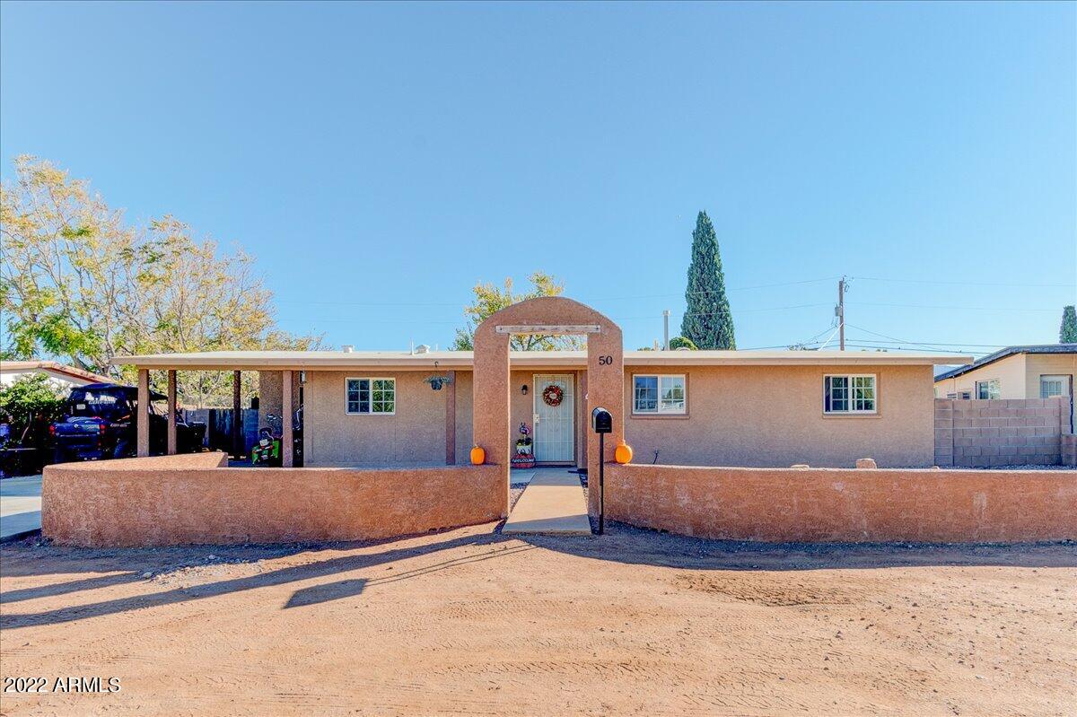 Wonderfully updated 4 bedroom home!  Also could easily be used as a 3 bedroom home with a beautiful designated office area.  Open concept living with updated kitchen counters, cabinets, stainless steel appliances. Tile has been updated, with neutral paint colors, creating a light and bright environment.  Check out the spacious Owner's Bedroom, so much space!  Huge backyard with extended patio area: covered & uncovered! Extra large paved driveway.