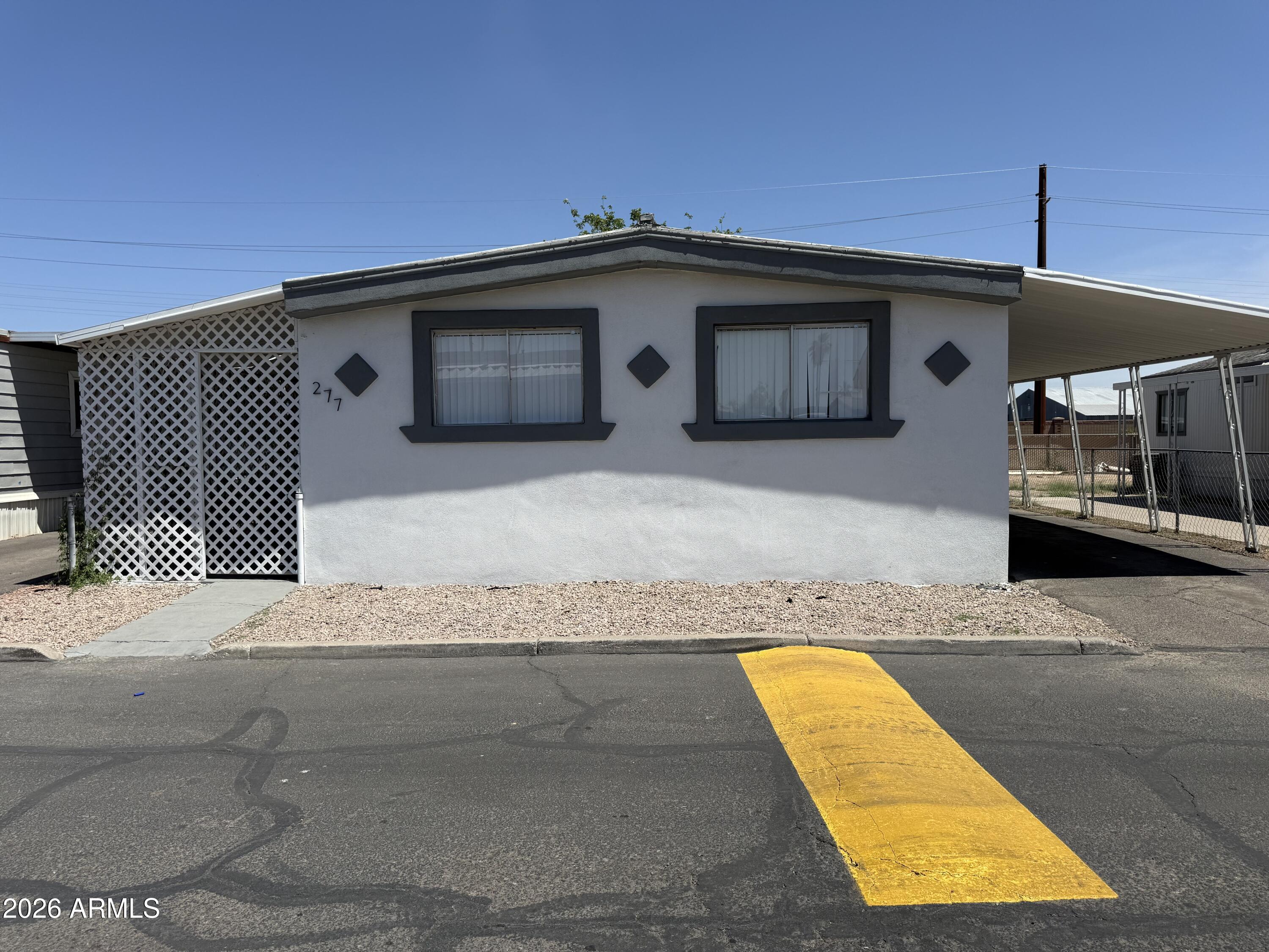 Don't miss this Beautiful home has been updated with Roof and Stucco! 4 bed 2 baths, renovated the inside freshly painted in and out,, 2 Car Covered Carport and  Patio with a Shed! Ready to move into a great community with a pool, basketball court, playground, laundry, etc. Close to Westgate and Drive In Theatre.