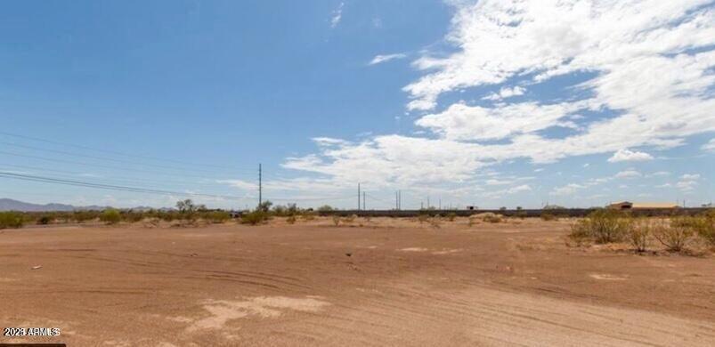 Don't miss this incredible opportunity to own property in one of Wittmann's most promising areas! Nestled on a paved road with water and electricity already on the property, this lot is ready for your dream home. Enjoy breathtaking mountain views and the freedom of NO HOA, giving you the flexibility to create the space you've always envisioned. A block wall lines the west side of the property, offering added privacy and security. With a minimum 2,600 sq ft home required per deed restrictions, this area is perfect for building a spacious residence or making a smart long-term investment. Whether you're looking to build now or hold for the future, this location combines natural beauty, convenience, and value.