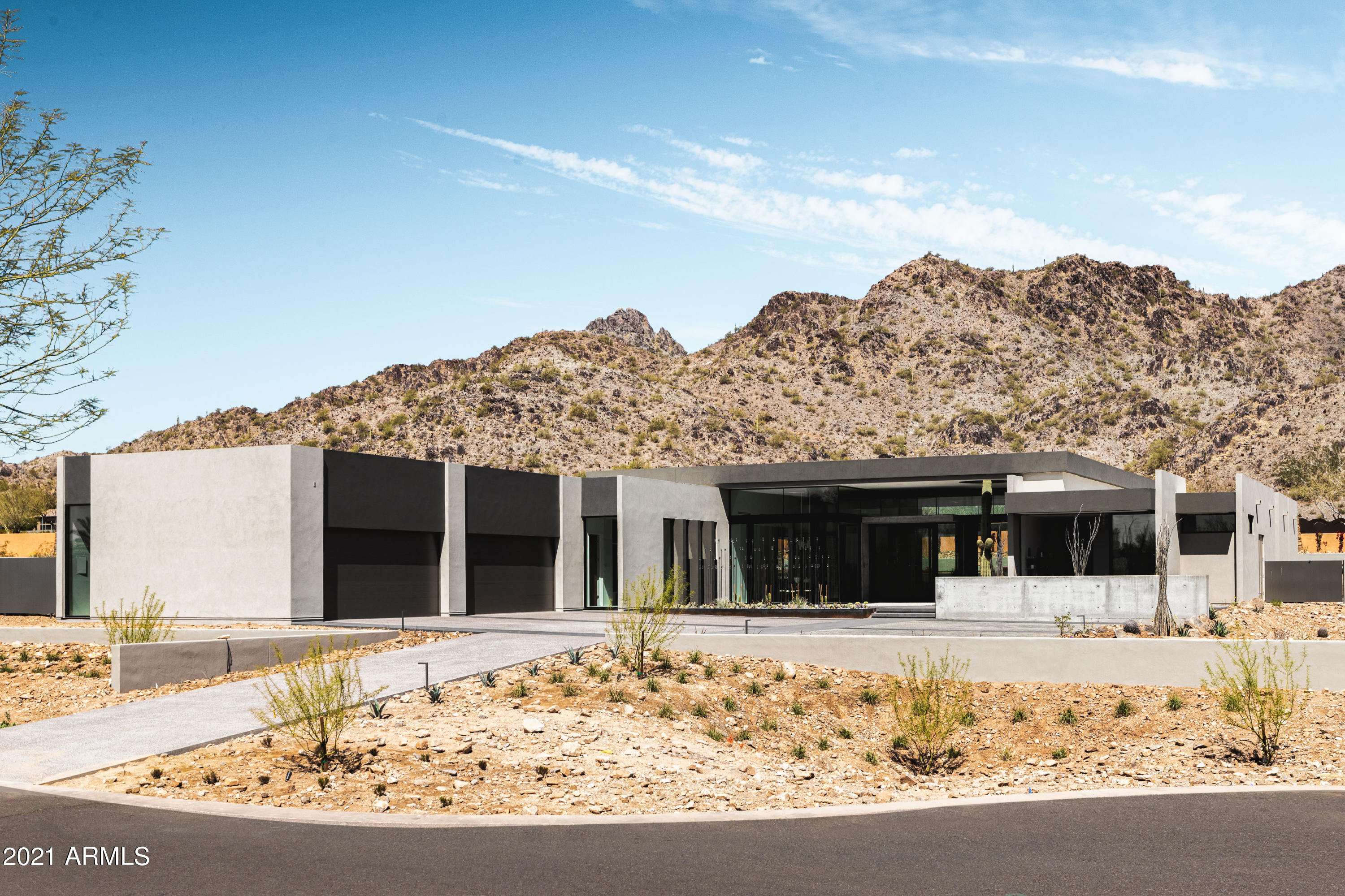 Stunning Modern Sanctuary set amongst the peaks of the Phoenix Mountain Preserve.  Designed by critically acclaimed architects, Kendle Design Collaborative and Greey Pickett, this new 2021 estate was conceived with a focus on embracing the natural beauty of the Preserve and creating harmony of light, air and water to create a sanctuary.  In collaboration with  Dwelling Design Interiors, each detail and finish of the home has been carefully executed by Wyatt Builders to create a remarkably unique living experience.

Whether it's the efficient floor plan, the 48sf chilled glass wine enclosure, 14' high ceilings with 30' powered door sliders or the exquisite wet edge pool, it's impossible not to be awestruck.  Call today for a private tour.