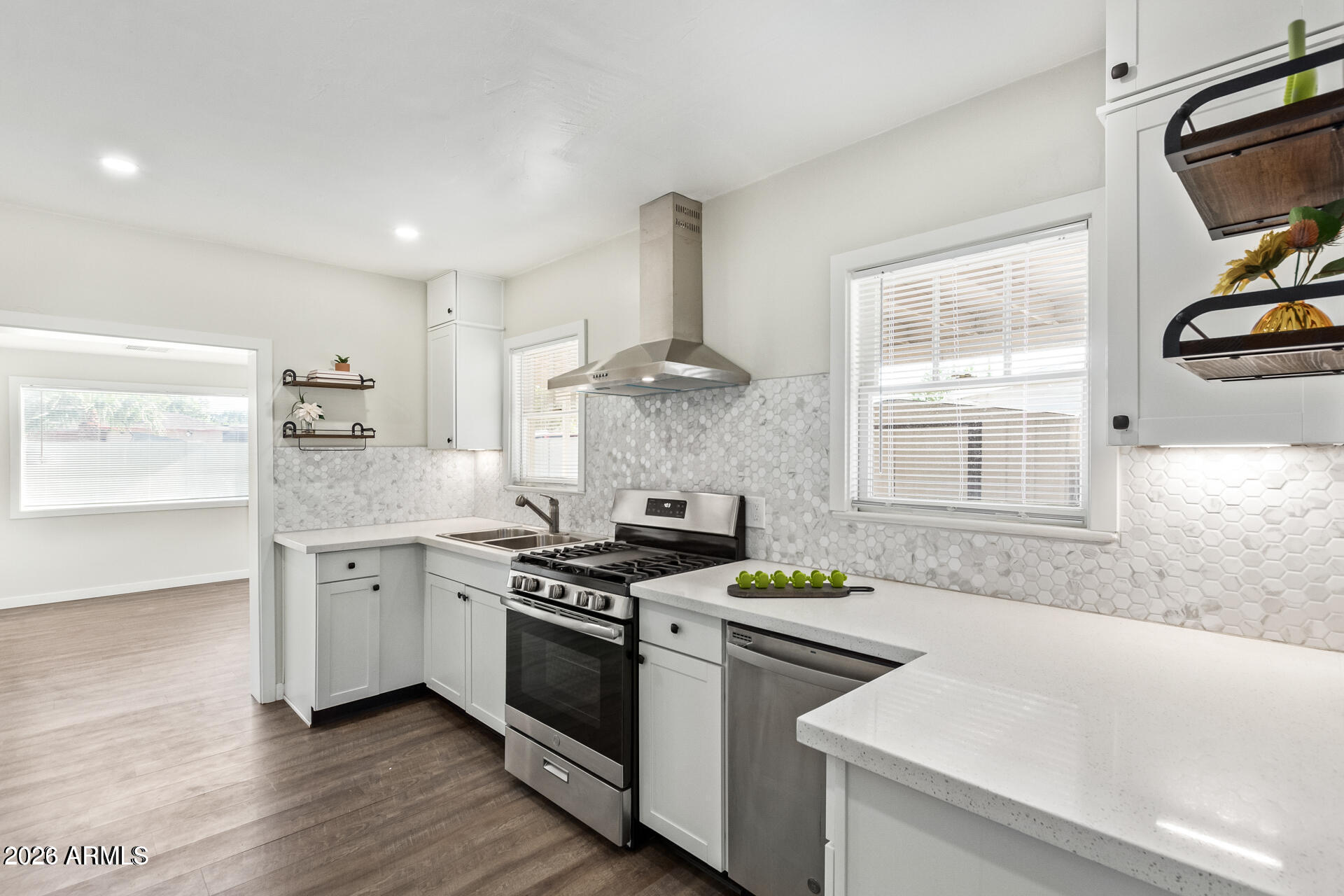 Move in ready & located in a sought after historical district, this 2 bedroom, 1 bathroom home has been thoughtfully upgraded throughout. Recent improvements include a new air conditioning system, offering peace of mind for years to come. A comprehensive remodel completed just a few years ago included updated plumbing, electrical, and added insulation for improved energy efficiency. The kitchen, bathroom, flooring, & windows have all been newly renovated, and a gas stove makes this home a true find for culinary enthusiasts. This generous lot sized home also includes a $40,000 solar system, offering immense City of Mesa utility savings! The list price reflects the buyer's assumption of the solar lease, giving the new homeowner immediate access to this added value & long term energy savings!