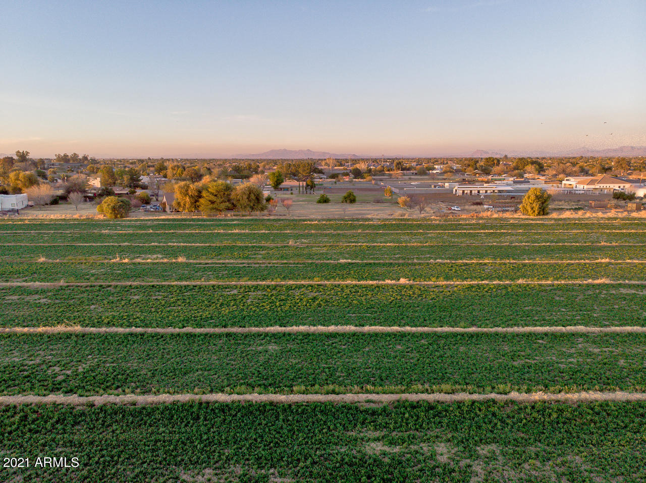 12.14 irrigated acres in a prime Gilbert location! Incredible opportunity located within minutes to Downtown Gilbert, San Tan Village, San Tan Loop 202, Rivulon, shopping, dining, & entertainment. Property is surrounded by residential acre properties.