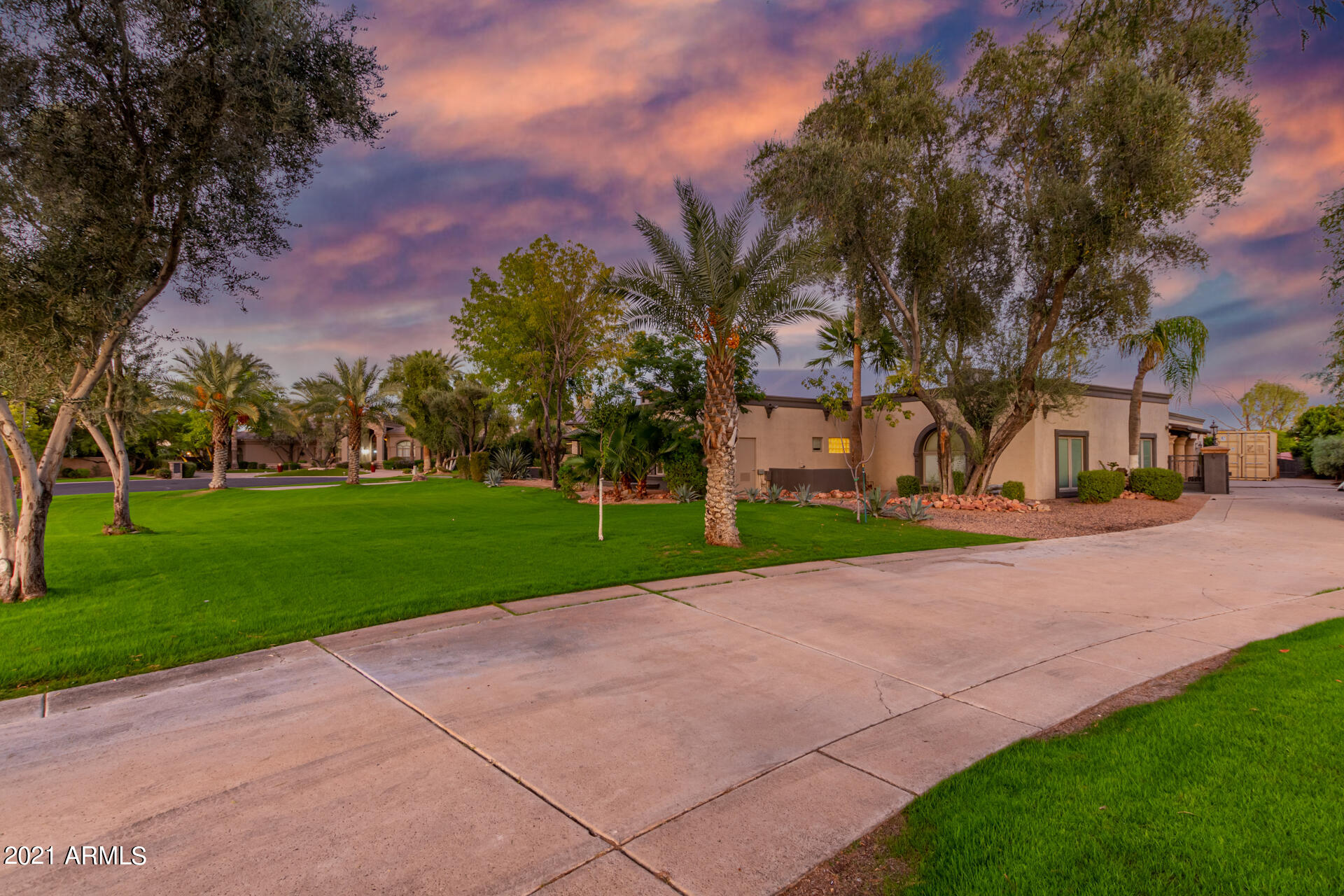 This home has it all, not to mention the location! Come see this beautiful and meticulously maintained home in Camelback Country Estates with 5 en-suite bedrooms, a split master floor plan, updated kitchen, wine closet, theater room, and a dream backyard for entertaining. Enjoy the private oasis including your own pool, sport court,  gym, and guest house. You will not want to miss this one!