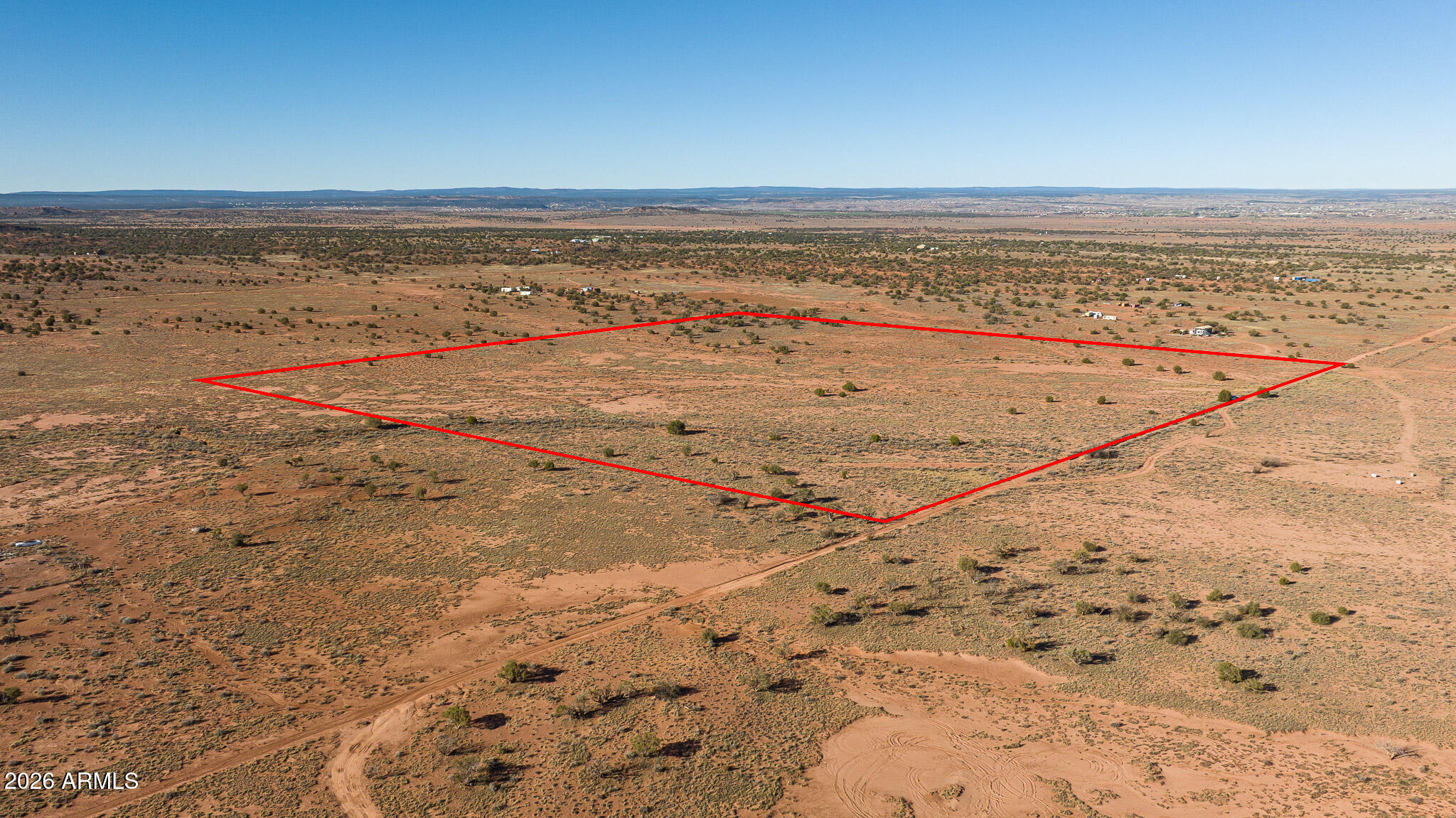 40 acres of Arizona land opportunity in Snowflake! This property offers wide-open space, panoramic views, and endless potential for your future plans. Whether you are looking to build your dream home, create a private retreat, establish a recreational getaway, or invest in land, this property gives you the room and flexibility to make it happen. Enjoy the peace, privacy, and natural beauty of Northern Arizona with stunning sunrises, sunsets, and star-filled skies. Bring your vision and take advantage of this rare chance to own 40 acres in Snowflake.
