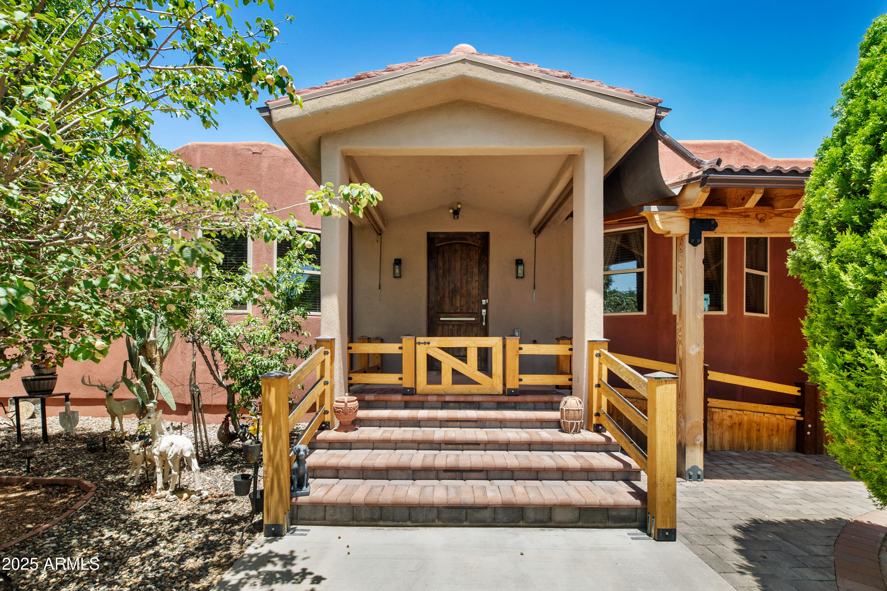 Rustic-modern comfort meets eco-friendly living!
Discover this stunning single-level home on just over an acre in the desirable Hillcrest area of Camp Verde. With 3 bedrooms all boasting their own en-suite baths plus a convenient guest powder room, this home is crafted for privacy and easy daily living. The heart of the home is an open, cathedral-ceilinged great room, complemented by a chef-ready kitchen with walk-in pantry, island, and wet bar.
You'll love the covered deck overlooking fruit trees, perfect for sunset sipping or weekend barbecues. The fully-paid solar system, central vacuum, water treatment system, and private water well add comfort, convenience, and efficiency.
Whether you crave quiet country living, energy-smart features, or room to roam, this timeless home has it all