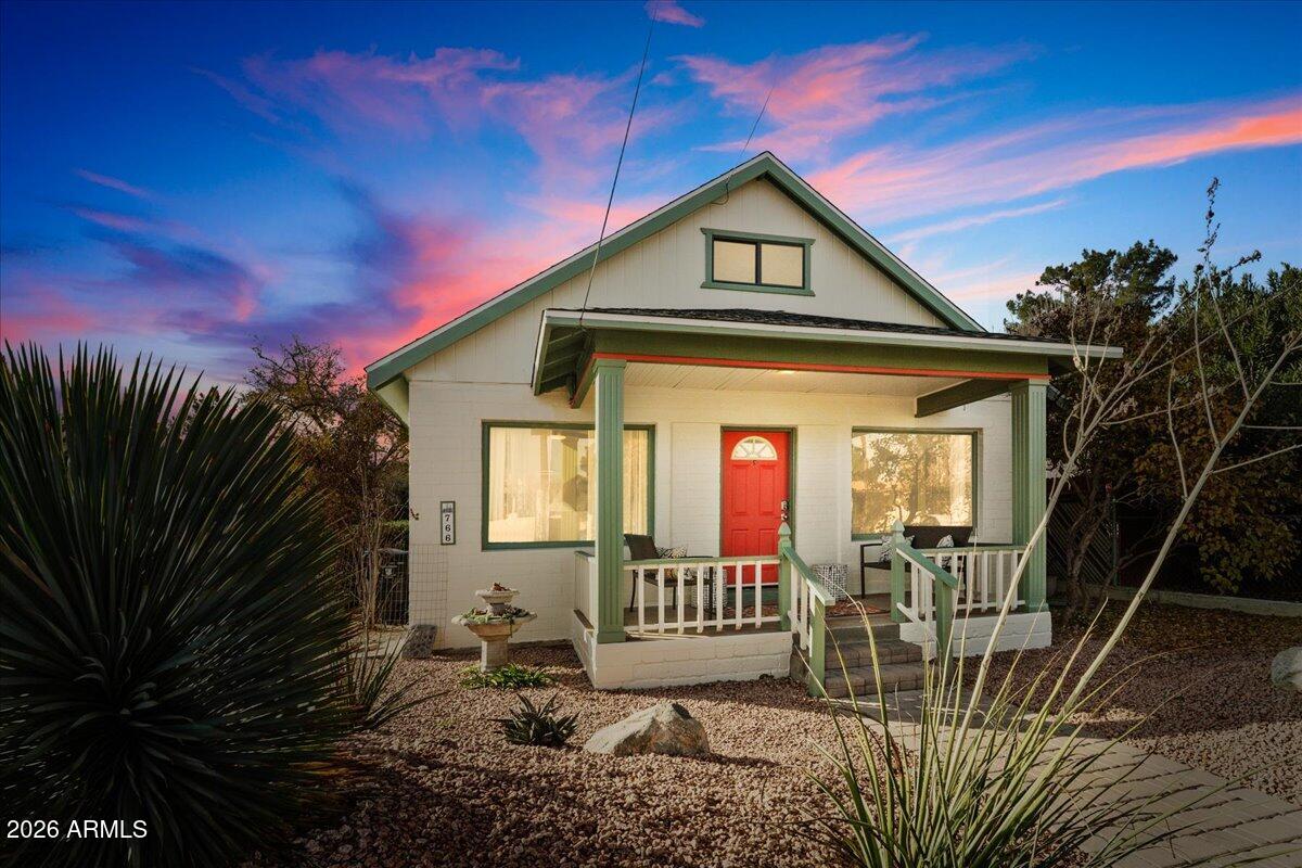 Two single family homes and a buildable lot in the Heart of Old Town Cottonwood!! Commercially zoned property features a 864 sq ft 2/1 consistently book (guest favorite) short-term rental and a separate 1386 Sq ft 3/1 main home used as long term rental, + a .11 acre separate parcel in the back. Completed home inspection. 
Perfectly positioned -just a 5-minute walk to Old Town Commercial District.  High-yield investment in a top Arizona tourism hub can also flex as a multi-generational setup - this historic property delivers. The 5-star short term guest cottage is turnkey- fully furnished including business license. Main house sq footage does not reflect bonus second floor- furnishings are available.  This property offers endless potential! Both homes feature coded entry for easy access.