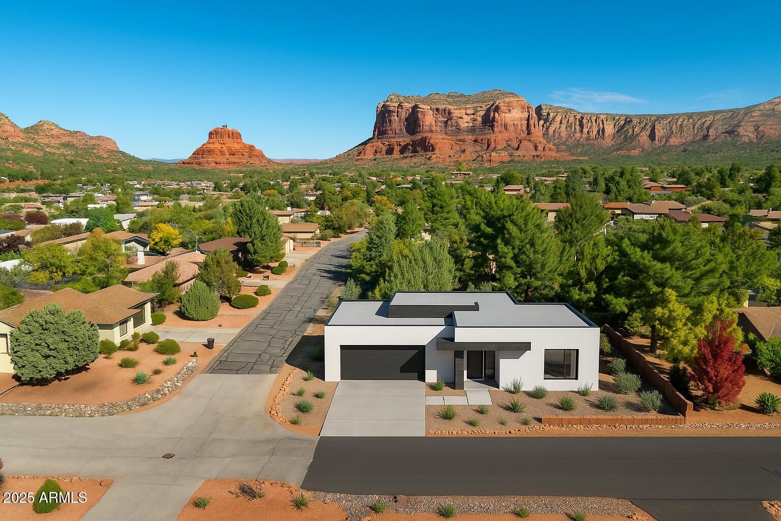 Imagine building your dream home amidst the gorgeous red rock views of Sedona, Arizona. This location offers full enjoyment of nearby hiking trails, parks, world-class golfing, and amazing dining and shopping options, yet is away from the higher-traffic tourist areas.
At 280 Concho, you will find everything you've been looking for: a quarter-acre, level lot, Surveyed with a site plan in place (see attached, floorplan, elevation, etc). The property is designated for site-built homes only, with a minimum size of 1400 square feet. It allows for 30-day minimum rentals, and the low HOA dues are only $330 per year. Whether you are planning on building now or later, or simply looking for an investment, this property should be at the top of your list!