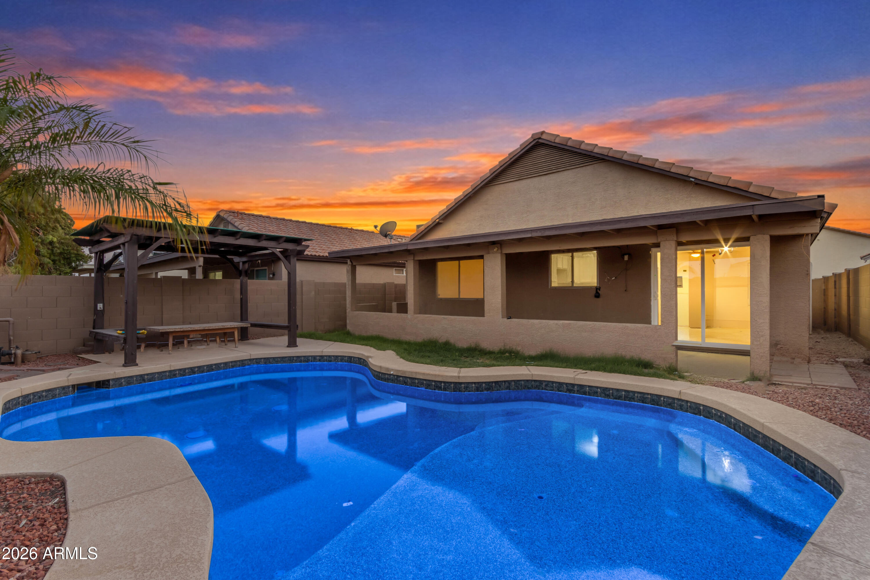 This beautifully refreshed Phoenix home checks every box! From the moment you step inside, you'll notice the care and attention that has gone into every detail. Fresh interior paint and brand new luxury vinyl plank flooring in all bedrooms, bathrooms, giving the home a clean, modern feel.
The kitchen and bathrooms have been thoughtfully updated with refurbished cabinetry, a resealed and freshly painted bathtub. The exterior has also been recently repainted, giving this home incredible curb appeal from the moment you arrive. A brand new sliding door leads you out to your own private backyard oasis, complete with a sparkling Pebble-Tec pool and a charming gazebo, perfect for entertaining or unwinding under the Arizona sky.