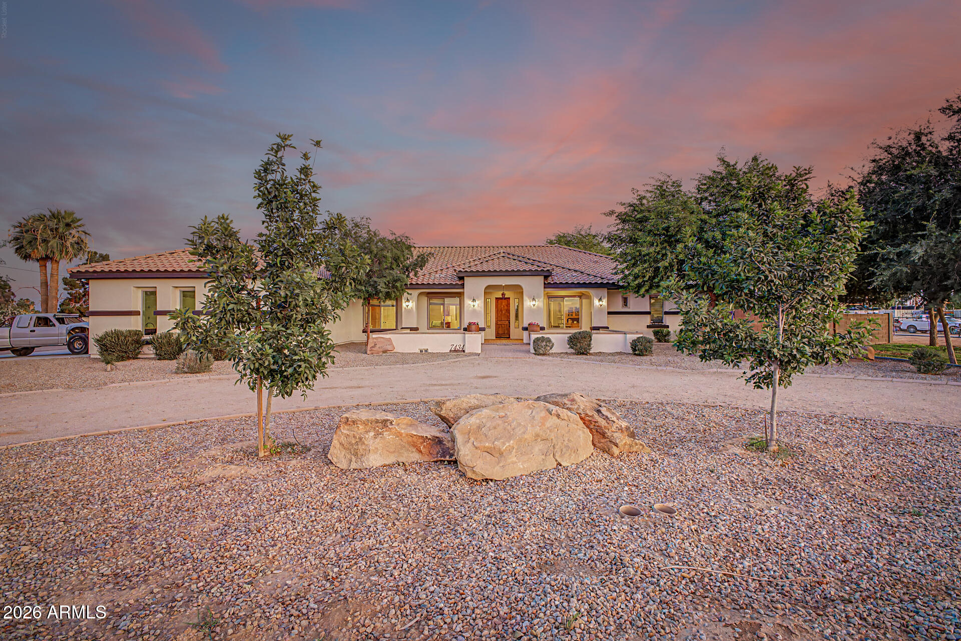 ***INCLUDES BOTH PARCELS 501-49-045B AND 501-49-045C*** Wow! Start living your dream in this exceptional estate where comfort & style blend seamlessly. From the moment you arrive, the lovely curb appeal sets the tone w/a 4-car garage, RV gate, circular driveway, mature landscaping, & a private courtyard entrance. Inside, you'll discover a home filled w/meticulous attention to detail, featuring tile flooring, archways, recessed lighting, high-end finishes, & surround sound. Multiple living spaces provide flexibility for every lifestyle, including an open den/office, living room, & an impressive great room enhanced by a wall-mounted fireplace & multi-sliding glass doors that create effortless indoor-outdoor living. Gourmet kitchen displays SS appliances, abundant cabinetry adorned w/crown moulding, tile backsplash, a pantry, & granite countersSpacious main retreat continues to shine w/double-door entry, direct outdoor access, an elegant ensuite w/a jetted tub, & a walk-in closet. Oversized backyard offers a covered patio, built-in BBQ, & an exterior fireplace. Equestrian enthusiasts will also like the horse stalls & expansive space for horses to roam freely. This gem won't last long!
