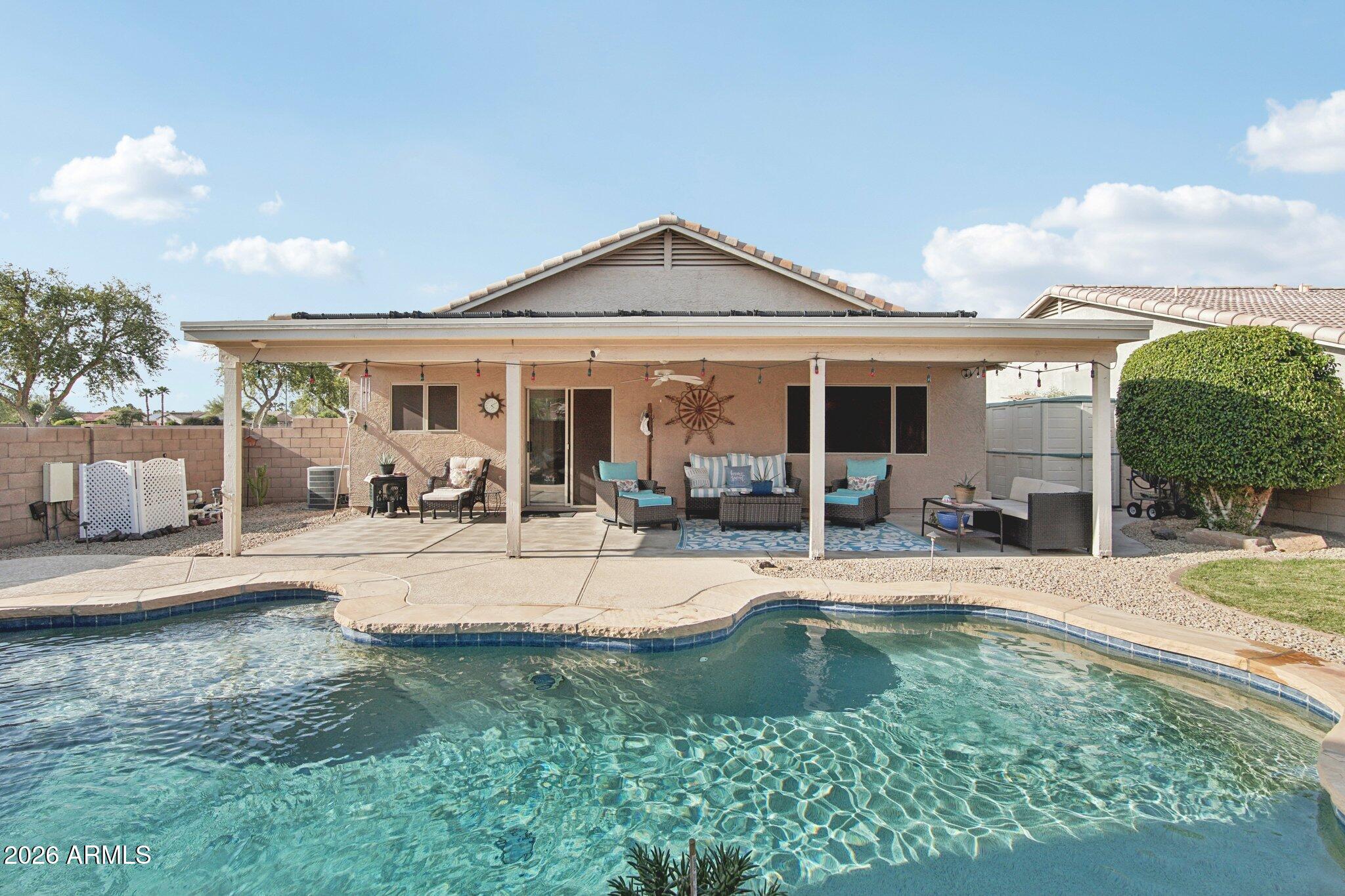 Tucked beside a lush greenbelt park in the desirable Kingswood Parke community of Surprise, this beautifully maintained home offers comfort, charm, and an unbeatable setting. Enjoy Arizona living in your own backyard oasis featuring a sparkling pool and peaceful park views. Inside, pride of ownership shines with a meticulously cared-for interior ready for its next chapter. Located in a non-age-restricted neighborhood with a low $45/month HOA, this home blends convenience, value, and lifestyle. Close to parks, schools, shopping, and dining, it is the kind of place buyers are excited to call home.