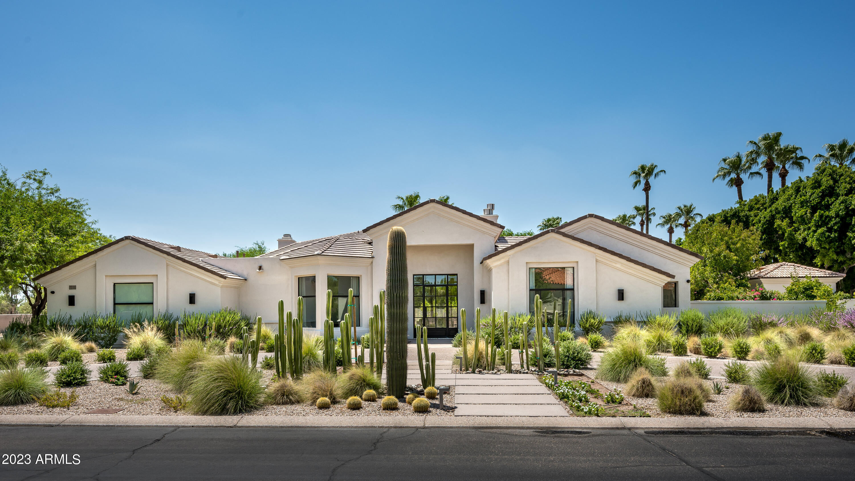Welcome to the epitome of luxury living in the exclusive guard-gated community of Cheney Estates. This stunning single-level masterpiece, crafted by the renowned builder MDF Development, offers a blend of elegance & modern convenience that will surely captivate the discerning buyer. This meticulously designed 4-bedroom, 4.5-bathroom home spared no expense. With a renovation in 2019 that ensures the highest standards of quality & style throughout.  This is not just a house; it's a statement of luxury & refinement. Custom cabinets, sub zero appliances and even a back up generator.  Landscape and pool were also redone in 2019 with a ''low maintenance design''. Don't miss your chance to own a masterpiece by builder MDF Development in one of the most sought-after communities in Paradise Valley.