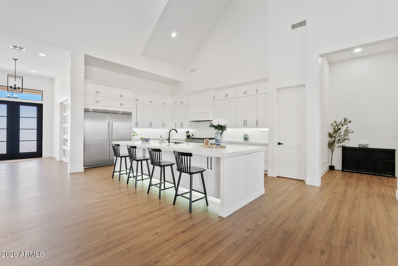 Experience luxury, space, and endless possibilities in this exceptional new construction home, completed in 2025. Situated on nearly 2 untouched acres, this 5,115-square-foot estate offers the perfect blend of modern design, functionality, and the opportunity to create the outdoor retreat you've always envisioned.

Inside, you'll find an expansive open-concept floor plan filled with natural light, soaring ceilings, and thoughtfully designed living spaces that are ideal for both everyday living and entertaining. With 5 spacious bedrooms, 5.5 bathrooms, a dedicated office, and private home gym, every detail has been designed to accommodate today's lifestyle. The oversized 3-car garage provides ample space for vehicles, storage, or hobbies.

One of this home's greatest features the ability to add your own personal touch. The generous homesite offers a blank canvas to design the backyard of your dreams--whether that's a resort-style pool, outdoor kitchen, guest casita, RV garage, sports court, or lush landscaping. The possibilities are truly endless.

Located in the growing San Tan Valley area, this home offers the best of Arizona living with breathtaking mountain views, nearby hiking and outdoor recreation, golf courses, shopping, dining, and convenient access to Queen Creek amenities. Enjoy the peace and privacy of estate-style living while remaining close to top-rated schools, everyday conveniences, and major commuter routes.

This is more than a home--it's an opportunity to create a lifestyle tailored entirely to you.