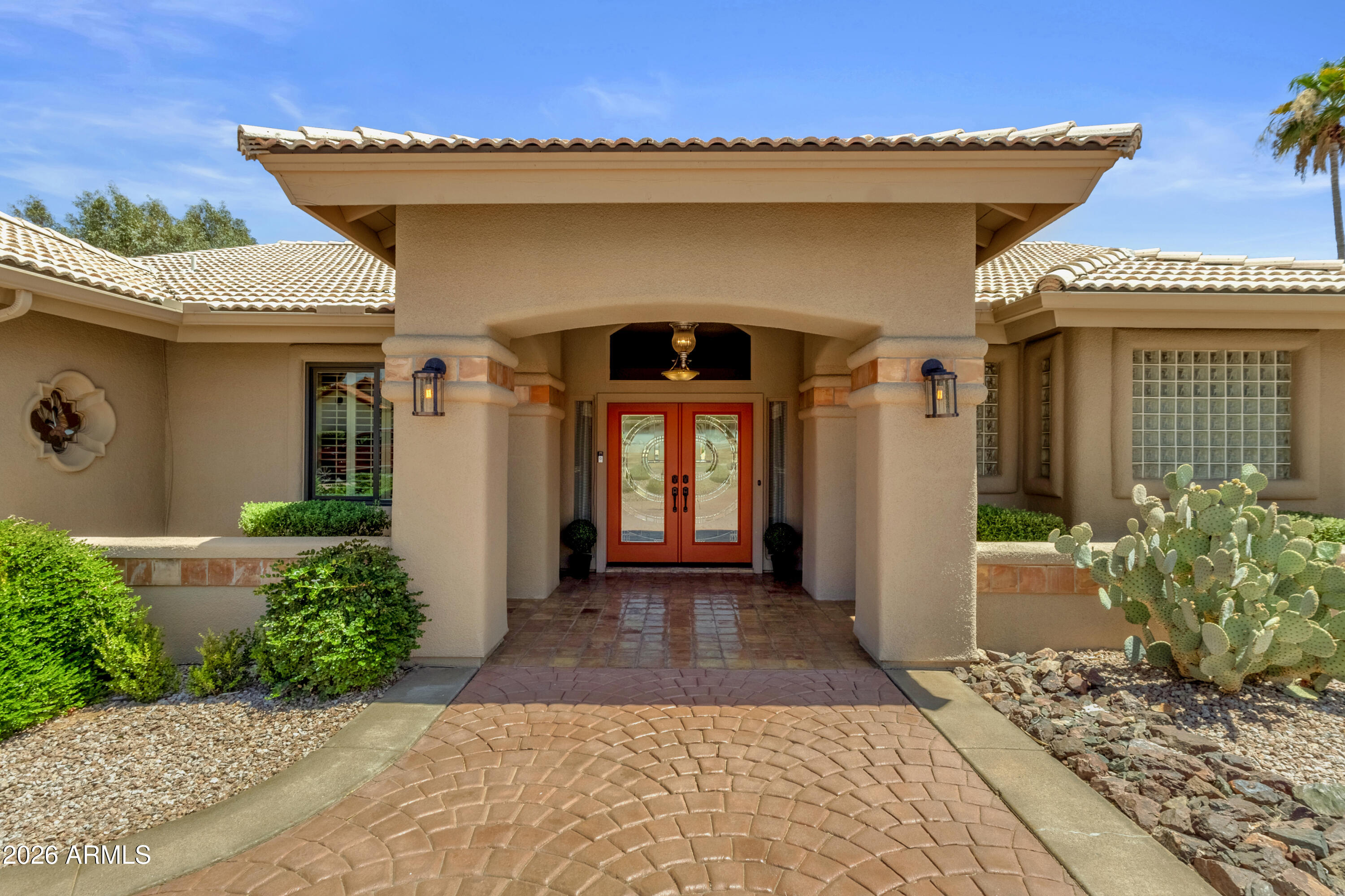 This well maintained home has fabulous views of RedRock and the Fountain.  Step in to a wall of windows that brings the outdoors in and the beautiful backyard.  Spacious living room also has an electric fireplace.  The kitchen has granite counters, newer stainless steel appliances, eat-in kitchen with views to enjoy.  This home features 3 bedrooms plus 2 bathrooms and is a split floorpan.  The master suite has an electric fireplace, access to the tiled patio, master bath has a walk-in shower, Japanese soaking tub, walk-in closet and lots of cabinets.  Guest bath has a walk-in tile shower.  House has recently been painted, Sparkling pool redone in 2016, and cool deck recently redone.  The yard also has orange and lemon trees.  And did I mention fabulous views.  
Very well maintained home.