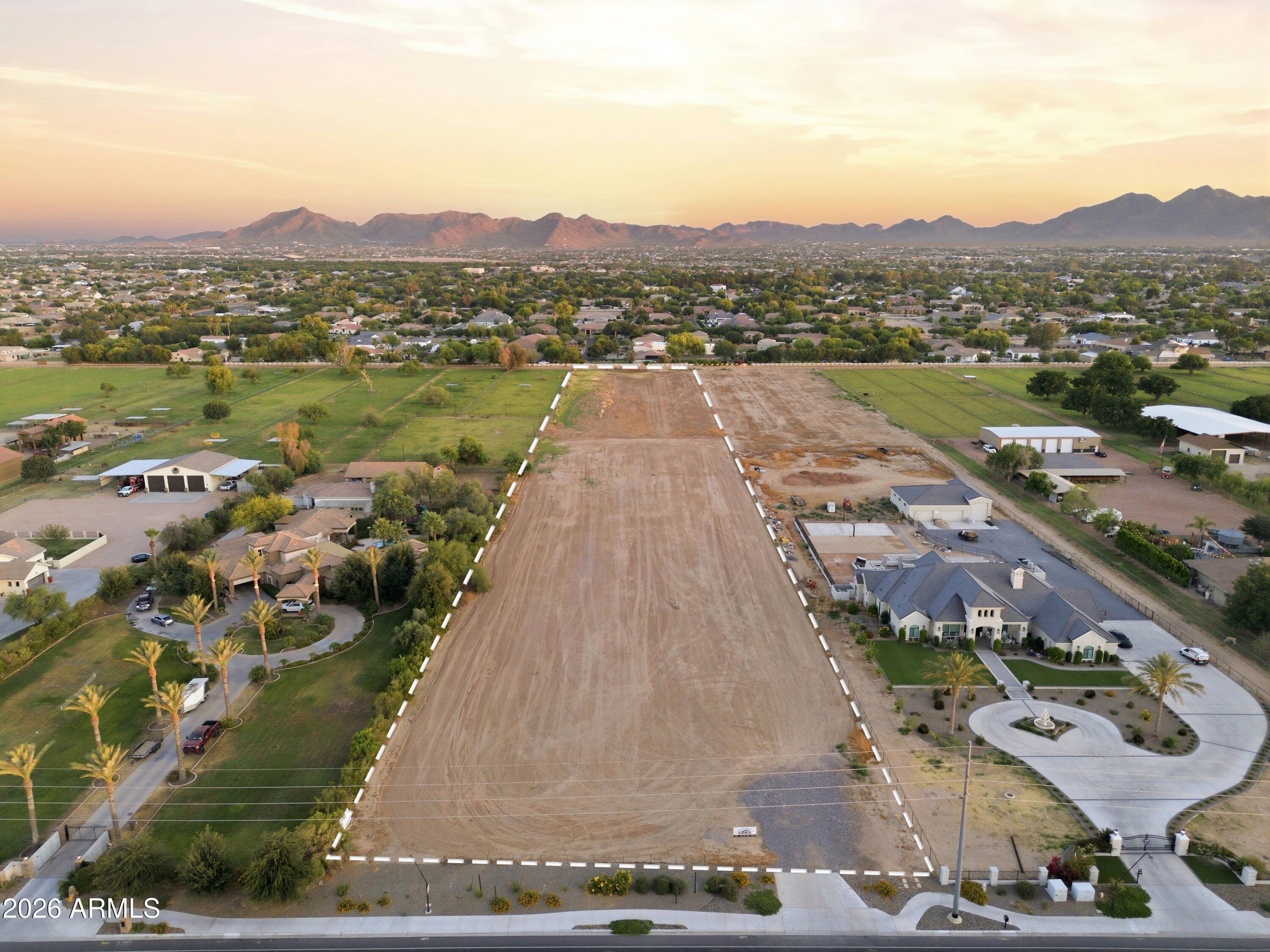 Location, location, location. Rare opportunity to own 6 acres of premium land in one of Queen Creek's most desirable custom home corridors. Property is nestled among multi-million dollar homes & offers the flexibility to build a luxury estate, equestrian property, family compound, or private retreat. Property is currently being divided into two 3-acre parcels, creating additional opportunities for development, investment, or multi-gen living. Flood irrigation available, room for horses, RV garage, workshop, guest house, sport court, &  more. Enjoy stunning San Tan views, open space, & privacy while remaining just minutes from QC Market Place. Multiple, dining, & entertainment options & A+rated schools nearby. Large parcels in this area are rare, making this an exceptional opportunity. create your dream property in the heart of Queen Creek.