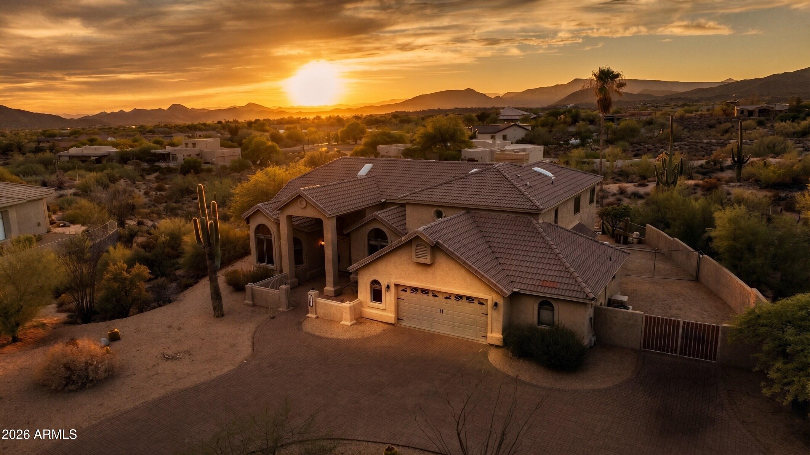 Some addresses you buy. Stardust Lane, you escape to. Tucked into the high Sonoran Desert where Carefree earned its name, this 3,541-square-foot retreat trades traffic noise for coyote song and streetlights for the darkest, starriest skies in the Valley. Mornings start with saguaro silhouettes and coffee on the patio while the McDowells turn pink. Evenings end under a sky so clear the street name finally makes sense. Inside, three bedrooms and three baths live large, windows pull the boulder-studded landscape into every room, so the desert isn't your view, it's your co-star. The primary suite feels large & comfy. And when you do want civilization, you're minutes from Carefree's town center- coffee roasters, galleries, & wine bistros. see now before someone claims the stars!