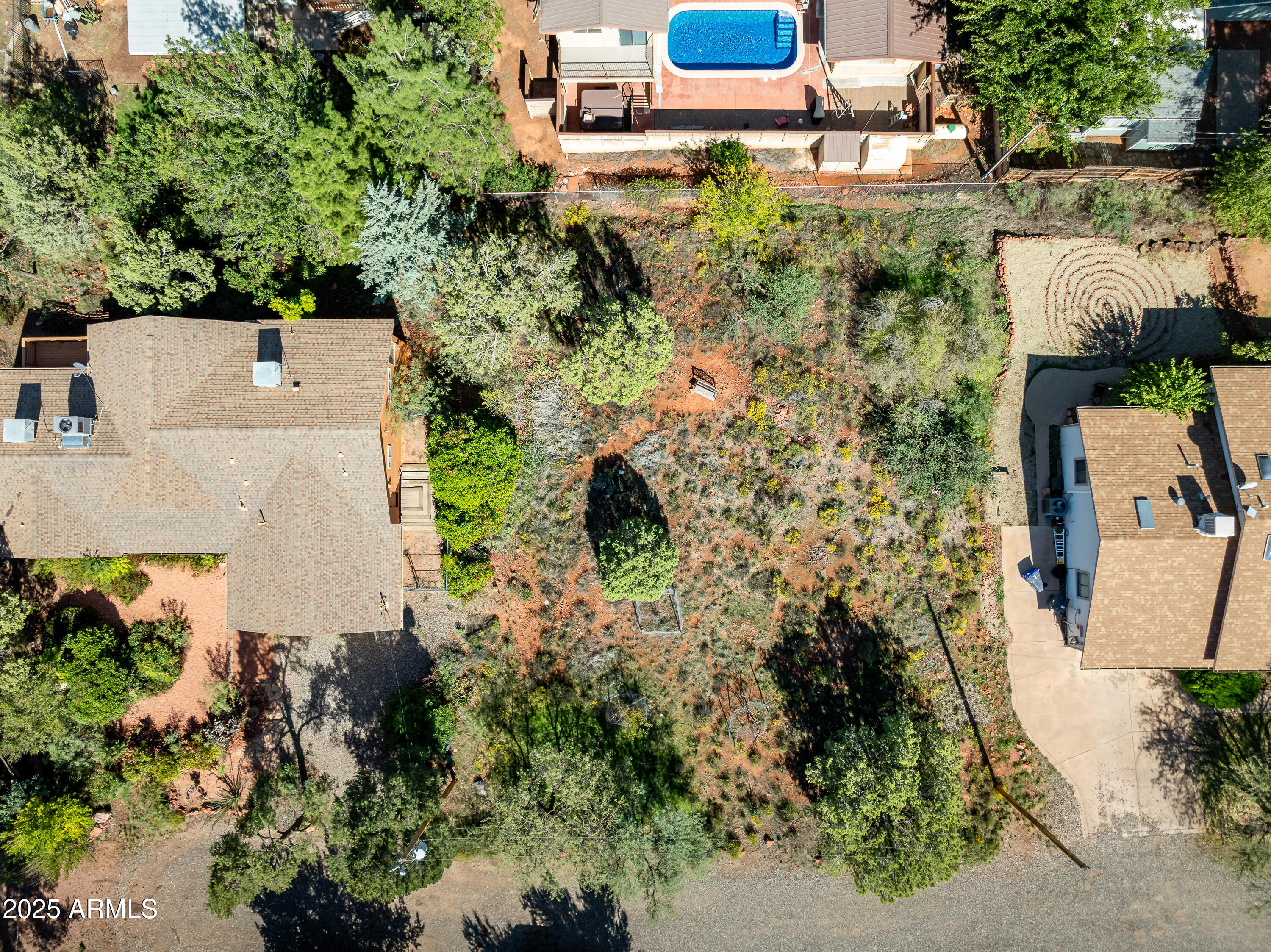 Flat lot. No HOA, STR-OKed (always verify, though). To build for yourself or a rental investor's ideal.
Some photos are AI-staged.
Owner has limited knowledge re: info about the lot.