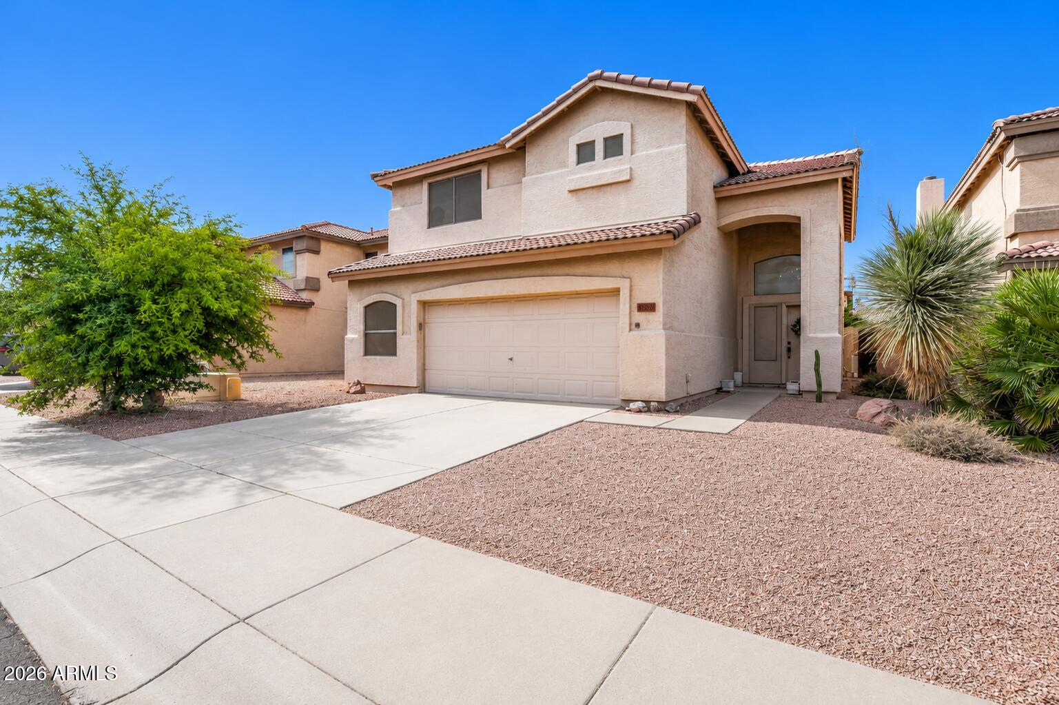 Beautiful home in desirable North Canyon Ranch featuring soaring ceilings and abundant natural light throughout! This 3-bedroom, 2.5-bath home offers a spacious eat-in kitchen with stainless steel appliances, luxury plank flooring downstairs, and brand-new carpet upstairs. The large primary suite includes a walk-in closet and relaxing soaking tub. Enjoy the north-facing backyard with a versatile detached workshop cooled by a mini-split system--perfect for a home office, hobby room, gym, or creative space. Conveniently located near schools, shopping and dining at Norterra, and just minutes from the I-17 freeway for easy commuting.
