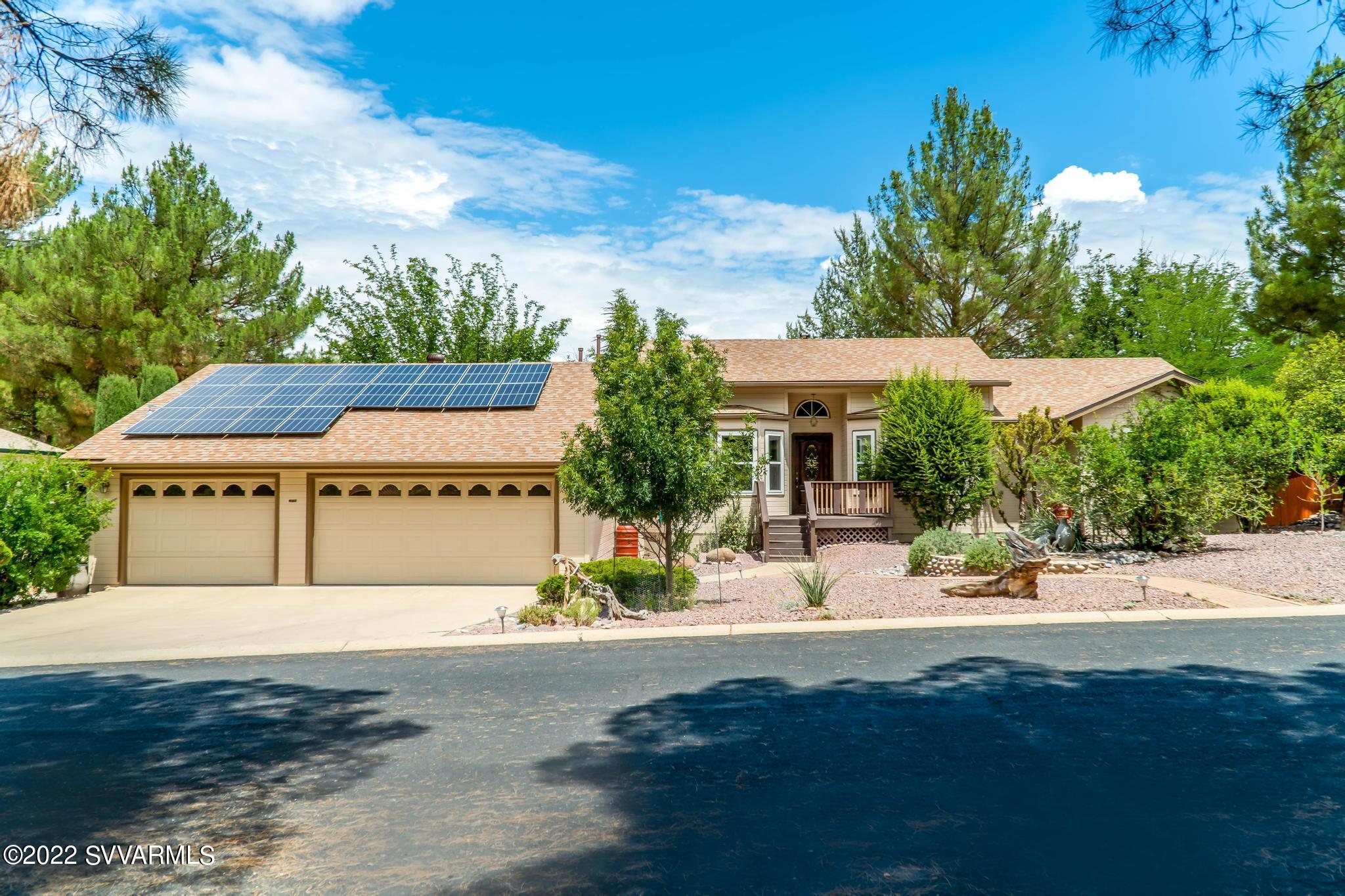 Beautiful home in a gated community surrounded by nature in the heart of Oak Creek Valley! This special home offers creek trail access just a few yards from your front door, a mini orchard, raised bed gardens, and a wrap-around deck for ideal outdoor enjoyment.

Home details include updated countertops and flooring, a rock-faced fireplace, and large walk-in closets in the primary bedroom and hallway. The kitchen features a stainless steel gas stove, large adjoining pantry/laundry room, custom pantry closet, and breakfast bar open to the formal dining area, with access to the living room or deck. The primary suite includes a built-in seating bench below the window with pine tree and garden views.

Enjoy the community pool, spa, pickleball, trails, and more. See supplement for more detai Supplement for: 10630 E Oak Creek TRL, Cornville, AZ 86325
Home: Vaulted ceilings, beautiful updated flooring and counter top, rock faced wood burning fireplace (can be propane).
Kitchen - spacious with breakfast bar, microwave, dishwasher, RO system, washer/dryer in laundry room included. 
Master Bedroom - built in window seat with view of garden and pine trees, private bath with shower and large walk in closet.
Large office/den that can also be used for a 4th bedroom and is just off entry and kitchen. (no closet).

Fireplace & Dryer are plumbed for gas (propane) should the buyer wish to switch these to gas. Buyer to verify in inspections.

Garden: Beautiful mature Pines and Mulberry trees, Fruit trees include Persimmons, Apricot, Fig, Pomegranate and Cherry. Raised bed garden, water recapture garden bins, flagstone patio, paver patio and more.

Solar: Low electric utility cost. Sunrun solar lease. $107.00 per month. (Water, Sewer and trash arranged with association)

Oak Creek Valley amenities:
Gated Community located in a stunning riparian and private creek access area in Northern Arizona. 
Community swimming pool and spa
Clubhouse available for events and rental
Beautiful creek front park with BBQ pit, horseshoe pits, playhouse, volleyball court, private beach and kayak launch.
Tennis/pickleball courts
Hike/walk trails throughout the valley along Oak Creek and Spring Creek and connecting to public land trails.

Oak Creek Valley POA features:
Lending library with DVD's, puzzles etc.

Clubhouse includes: updated kitchen, pool table, ping pong table, TV with exercise and yoga videos for individual or group use.

Swimming facility has pool, hot tub and shower access. Seasonal use.

Care group: active volunteer group of residents that help people recovering from surgery/injury.

Local Groups include but not limited to: social group, trail committee. Groups change based on volunteers.