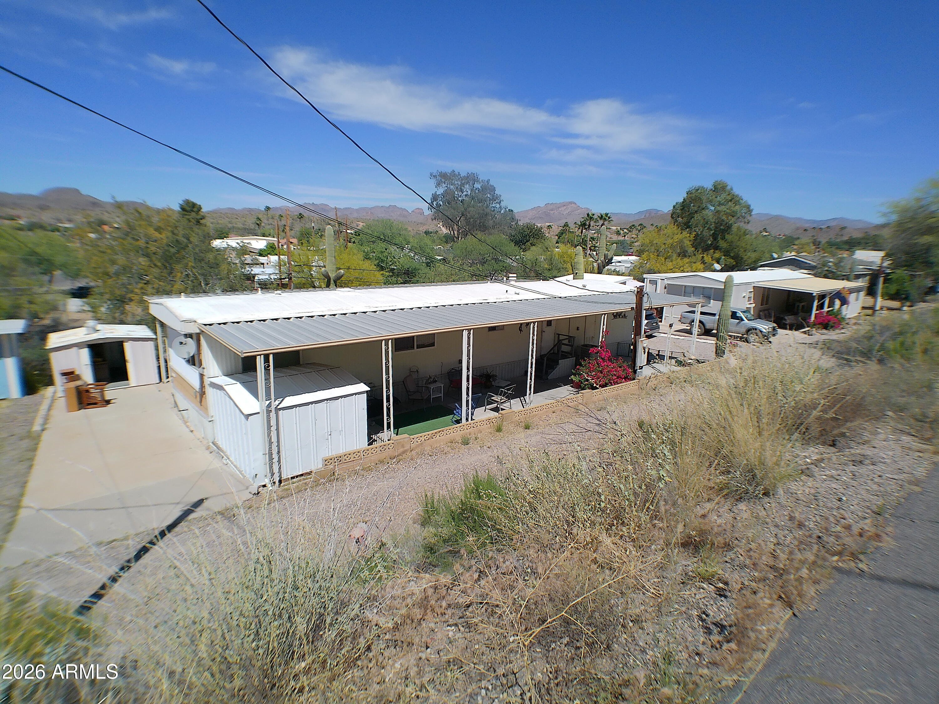 This inviting and well-kept 2 bedroom, 2 bath single-wide offers comfort, convenience, and plenty of usable outdoor space. Enjoy parking on both ends of the home, making access easy for you and your guests.

🌿 Outdoor Features

Covered front patio perfect for relaxing

Large back deck ideal for entertaining

Two spacious, well-built storage sheds

Extensive concrete work around the home for clean, low-maintenance living

Inside and out, this home has been thoughtfully cared for and is ready for its next owner.
More Photos coming soon!
