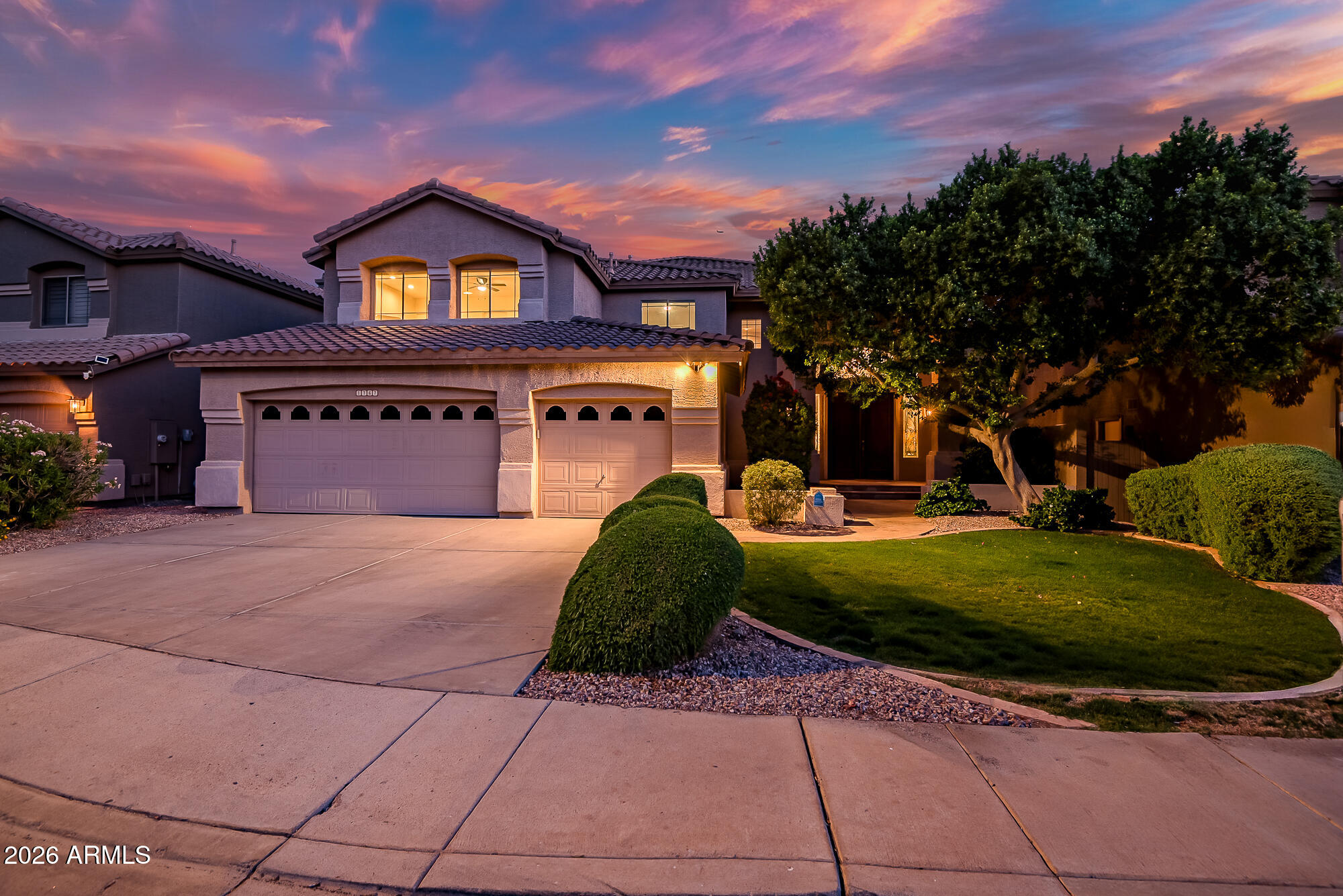 Nestled in the Ahwatukee Foothills, this 5 bedroom + office home offers the kind of lifestyle people rarely leave. With mountain views from nearly every angle and South Mountain hiking and biking trails just minutes away, this is Arizona living at its best. Downstairs features a beautifully upgraded kitchen with quartz countertops, waterfall island, double ovens, KitchenAid appliances, plantation shutters, gas fireplace, and wet bar perfect for relaxing or entertaining. You'll also find a private office, laundry room with access to the extended length 3 car garage, and a downstairs bedroom with ensuite bath ideal for guests or multigenerational living. Upstairs offers three additional bedrooms, including an oversized flex space perfect for a playroom, media room, gym, or additional... bedroom setup. The primary suite features a rare private sitting retreat with its own fireplace, balcony access, marble countertops, secondary vanity, and wrap around walk in closet. Outside, enjoy a heated pool and spa with waterfall feature, built in misters, lush landscaping, north/south exposure, and unforgettable mountain views. This is more than a home. It's the foothills lifestyle people wait for.