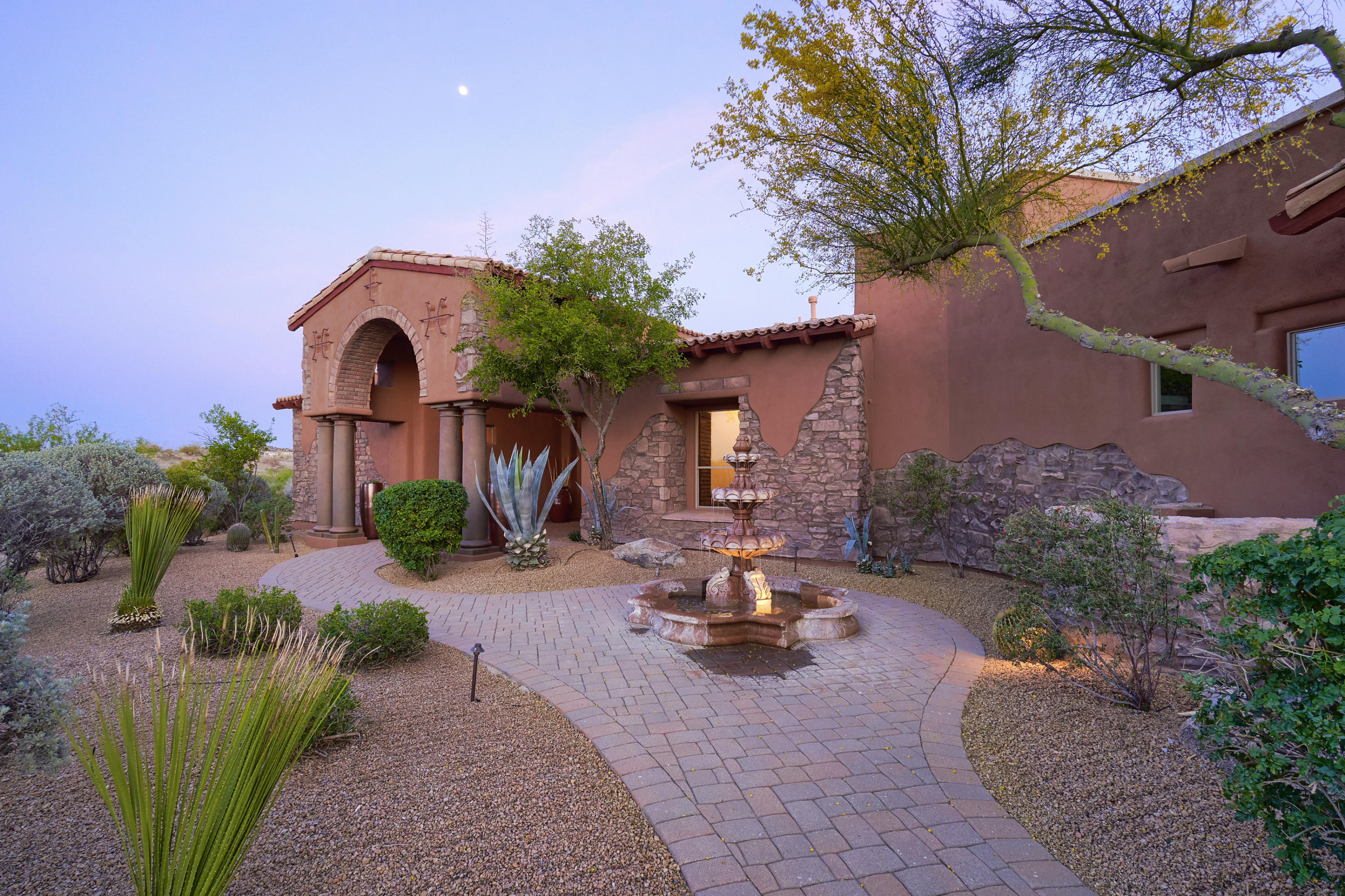 This truly breathtaking Luxor Custom sits on one of the best lots in gated Sonoran Crest & features a split 4 bedroom, 5.5 bath, office, media room, & full guest house. This awesome floor plan has no steps & comes w/all of the upgrades.   Chef's kitchen has SS Wolf/Subzero appliances, custom 42'' alder cabs, huge island w/seating, separate wet bar, & large family room w/stone fireplace and custom basket weave ceiling treatment. Master is massive & features separate sitting room & huge bath w/snail shower, soaking tub, dual vanities, & his/hers closets.  Back yard is like a resort w/new turf yard, large pool/spa w/ multiple water & fire features, tons of boulders, b-in BBQ, & massive covered patio. Full guest house has family room, full kitchen, & separate bedroom/bath. 5.5 car garage too!