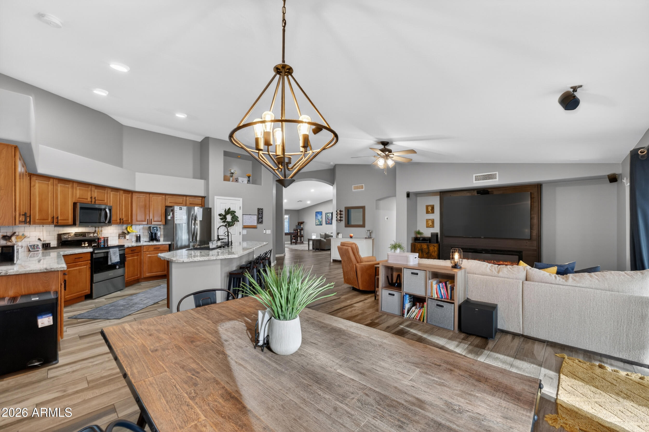 Five minutes. That's all it takes to get to Costco, San Tan Village, Cooper's Hawk, TopGolf, Main Event, and the long awaited Perry's Steakhouse at Gilbert's new Northside development. And tucked right in the middle of it, at the end of a quiet cul-de-sac, is the home that makes it all make sense. Inside, everything has been redone. New flooring. New countertops. Renovated bathrooms. Fresh paint, new baseboards, new hardware. Two brand new AC units. A backyard built from scratch. Every corner of this home was touched with intention. Your kids are riding bikes while you prep dinner. The backyard is private, oversized lot, no one behind you, just space and quiet that's genuinely hard to find in Gilbert right now. This is the kind of block families move onto and don't leave.

When you're ready to venture out, a minute to the Loop 202, five minutes to Mercy Gilbert Hospital, eight minutes to Agritopia, fifteen to Downtown Gilbert. Everything your family needs is already mapped out around this address.

Come tour this home.