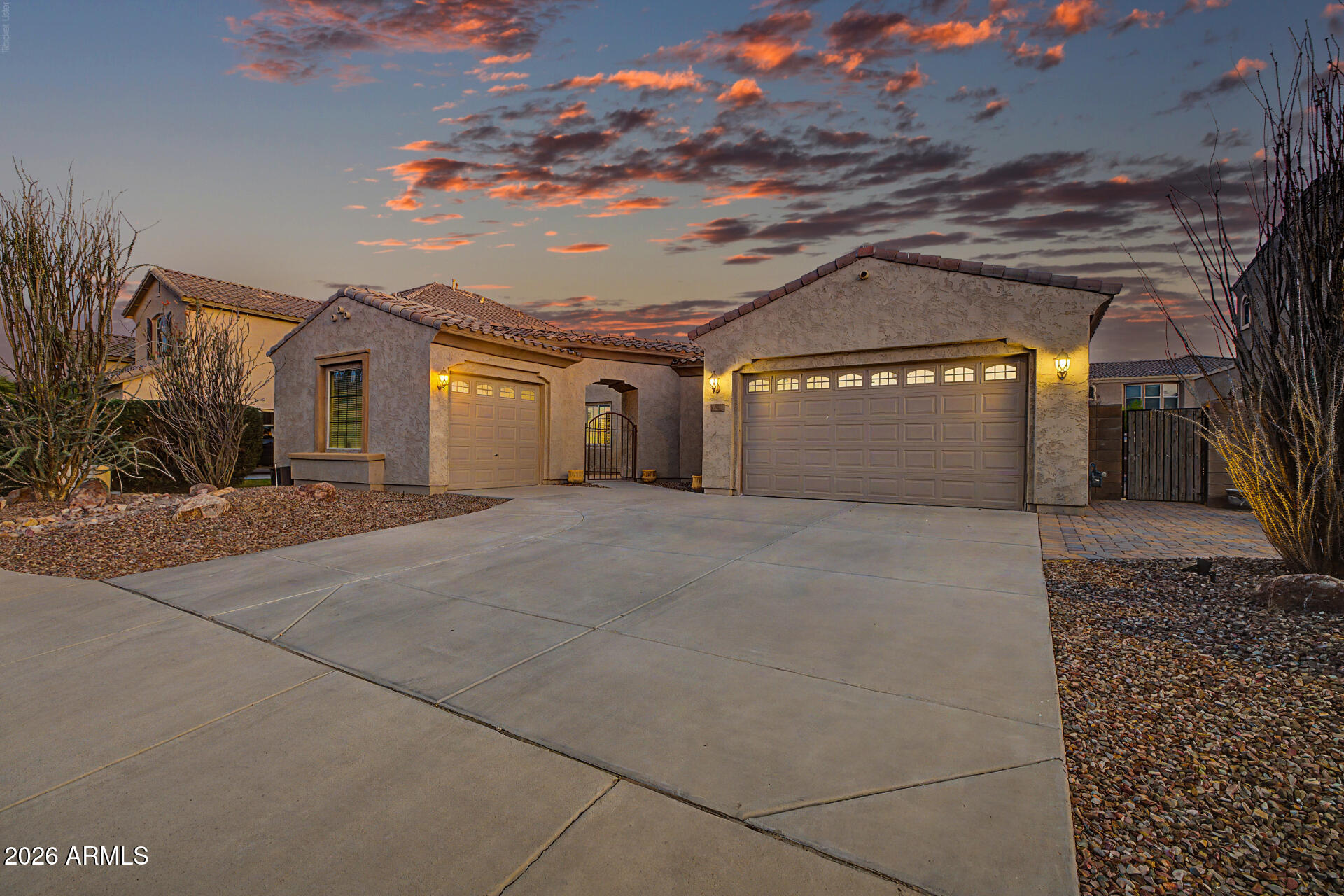 Rare Chandler basement home with nearly 4,000 square feet, 5 bedrooms, 3.5 bathrooms, owned solar panels, a split 3-car garage, and a private pool.  Pass through the gated front courtyard and step inside to soaring 12-foot ceilings and 8-foot doors on the main level. The gourmet kitchen features a large island, granite countertops, gas cooktop, double ovens, ample cabinetry, and a breakfast nook overlooking the courtyard.  The main level includes the primary suite, two additional bedrooms, 2.5 bathrooms, formal living and dining rooms, and a laundry room. A wide staircase leads to the finished basement, creating a true second living space with a large media/family room, two additional bedrooms, including one with a Murphy bed, a full bathroom, and substantial storage.  Outdoor living begins with the front courtyard and continues to the backyard featuring an extended covered patio, synthetic turf, and pool.  Located near Centennial Park, top-rated Chandler schools, shopping, dining, and Loop 202. This home offers a combination of space, layout, and basement living rarely found in Chandler.