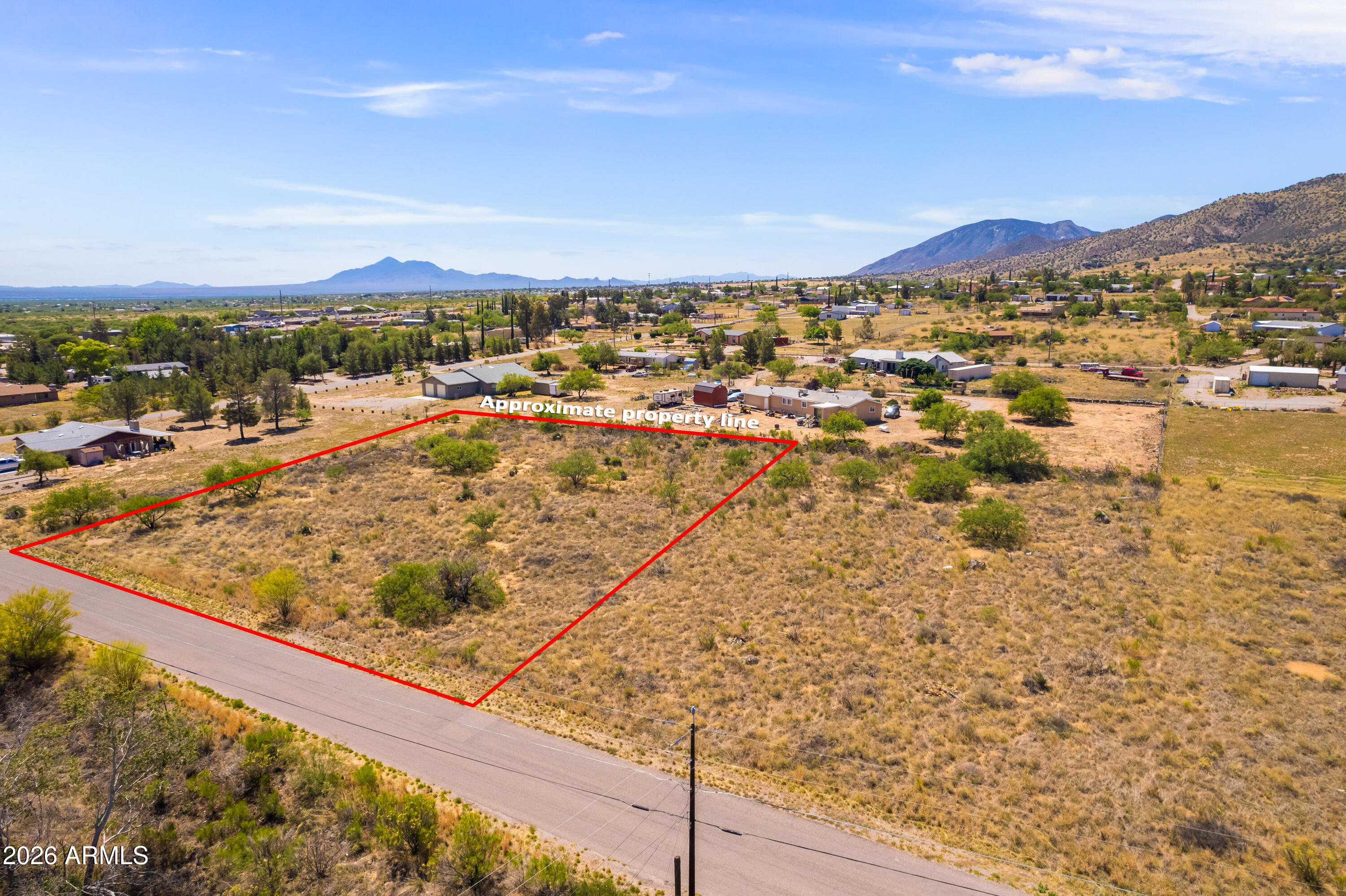 Build your dream home on this beautiful 1.01 acre parcel with stunning views of the Huachuca Mountains and nearby Carr Canyon Waterfall. This very buildable lot offers water at the property line with electric close by, making it an ideal opportunity for your custom home or future investment. Enjoy breathtaking Arizona sunsets, peaceful surroundings, and wide-open space while still being conveniently located just south of Ramsey Canyon Road and only minutes from town, shopping, dining, and amenities. A rare combination of natural beauty, convenience, and potential! There are 2 lots available side by side see MLS#7026619.