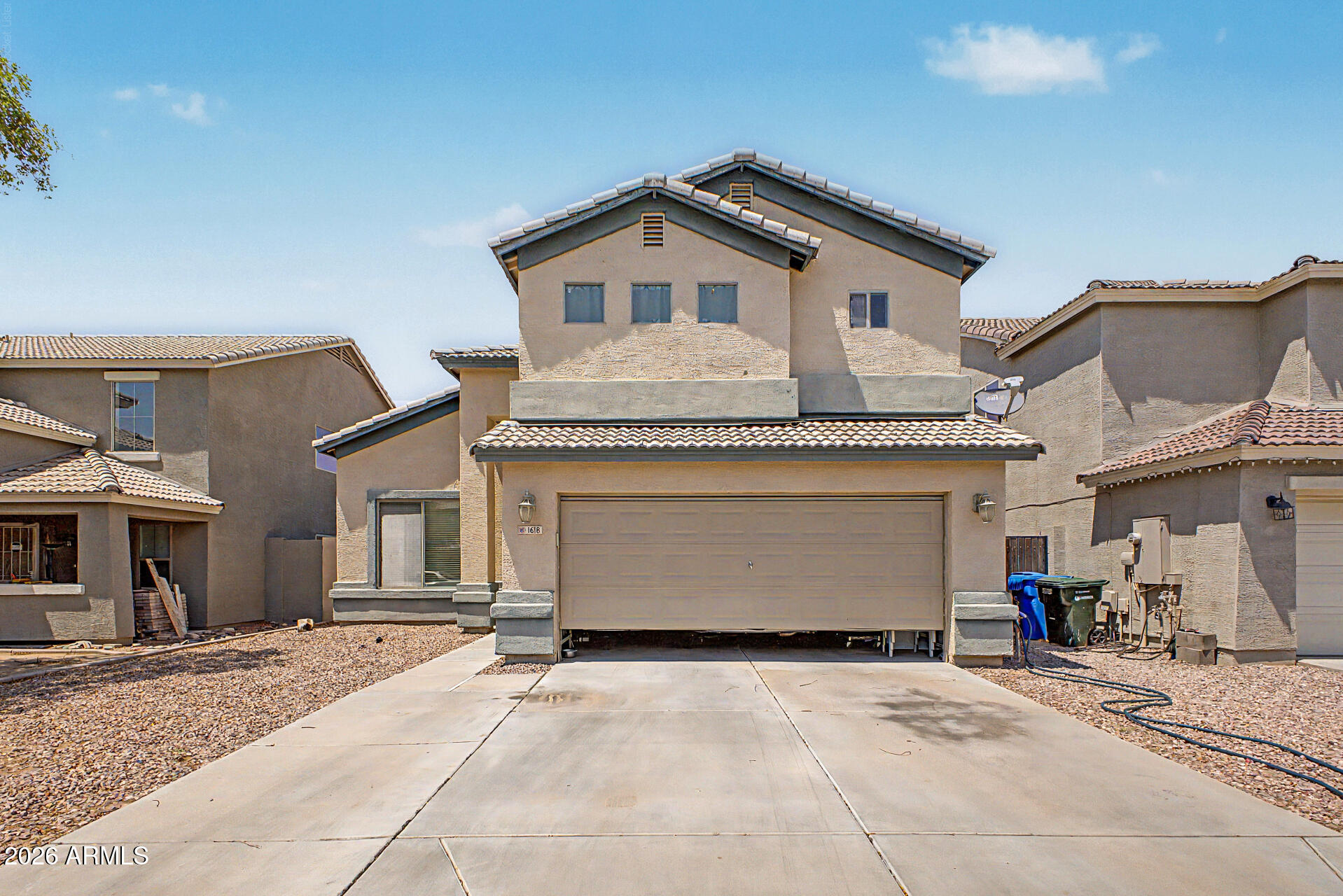 Welcome to this spacious 2,352 sq. ft. two-story home featuring 4 bedrooms and 3 bathrooms, offering a flexible floor plan perfect for multigenerational living, investors, or families needing extra space. The home features a desirable main-level bedroom and full bathroom, providing privacy and convenience for guests, extended family, or a home office. Enjoy the open feel created by the soaring vaulted ceilings and abundant natural light throughout the home from the many windows. The upstairs layout offers additional bedrooms with jack-jill bathroom and Master Suite. The low-maintenance dirt backyard provides a blank canvas with endless possibilities design your own dream outdoor retreat, add landscaping, create a play area, or customize it to fit your lifestyle