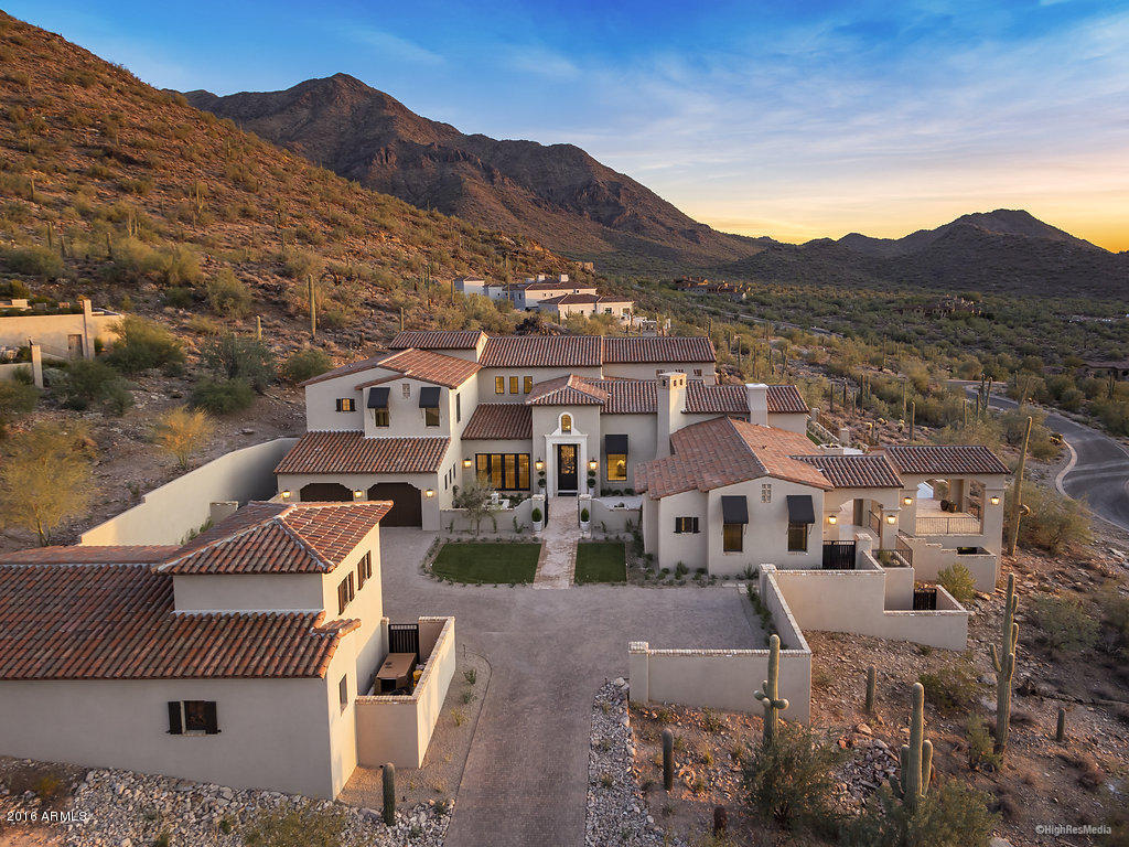 This recently completed spec home in the Upper Canyon of Silverleaf has remarkable views. The 8,000+ square foot, 6 bedroom home by Calvis Wyant Luxury Homes picks up dramatic unobstructed city light views and mountain peaks in every direction. The attention to detail and quality is evident in the finishes chosen by Decesare Design Group, offering what everyone is asking for and can't find in today's market. The well thought out floor plan works wonderfully for intimate family gatherings or entertaining large groups. Photos come close, but this home needs to be seen to be believed!