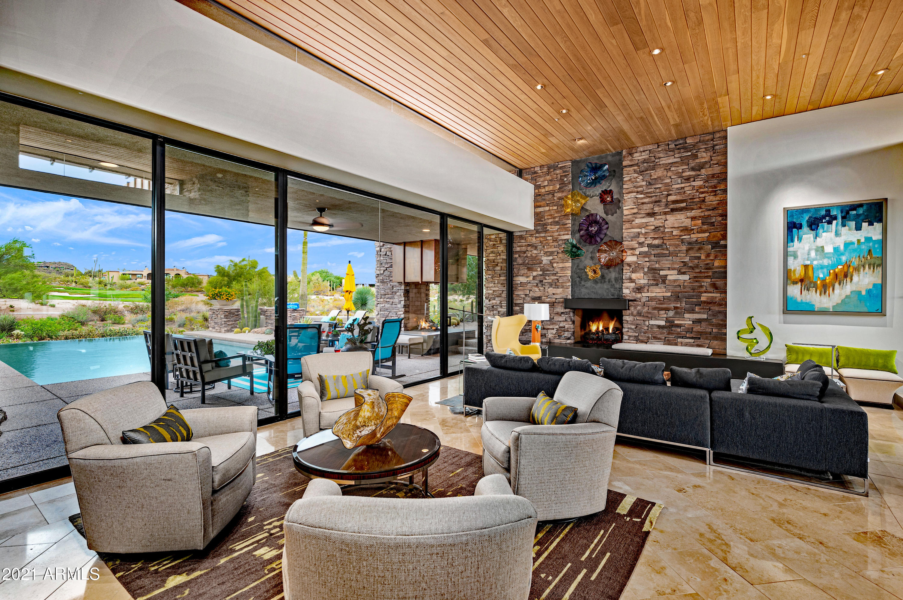 A timeless collaborative masterpiece, meticulously reimagined by Lisa Tate, originally designed by renowned architect, Bing Hu and built by Dick Lloyd, set in the top world-ranking, luxury golf community of Desert Mountain.