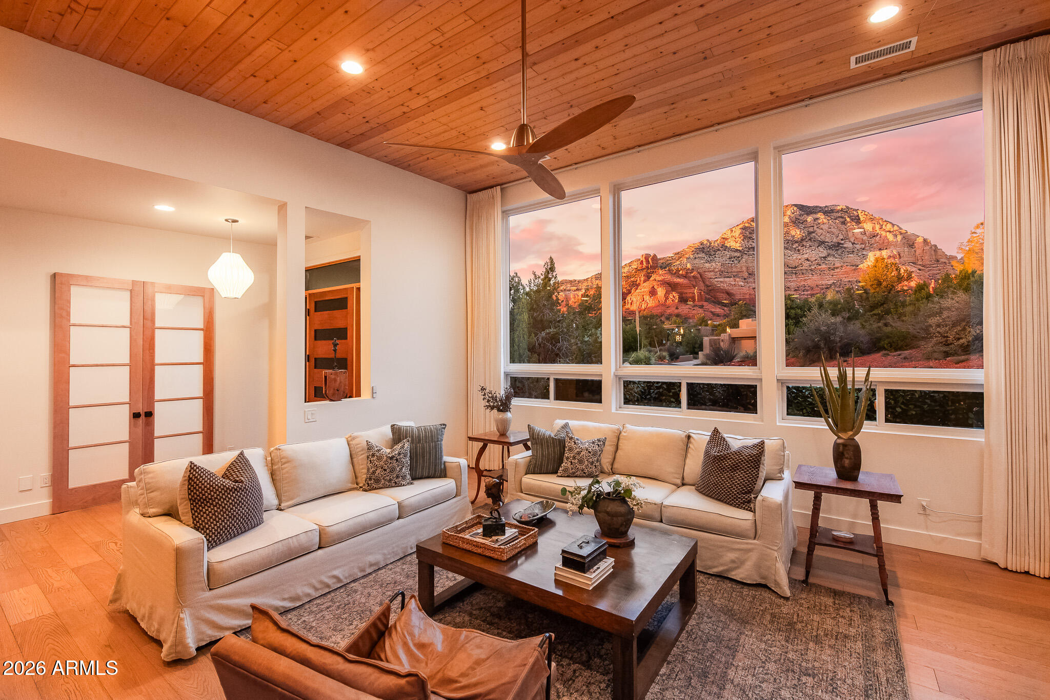 Incredible, Unblockable Red Rock Views!
This beautiful contemporary home is tucked away at the end of a charming little lane in the heart of Sedona. Thoughtful design allows for expansive views while still providing privacy throughout. Built in 2021 it shows like new! The contemporary design elements of the exterior continue inside. White oak and, tile floors, maple kitchen cabinets and bathroom vanities, and artful fixtures and window coverings all contribute to the clean, crisp contemporary vibe. the living area is all on one level and includes 3 bedrooms, all with ensuite baths, the living room, kitchen and dining room all flow together elegantly.. The list of amenities is long and can be found in the document section . All furniture available under separate bill of sale with exceptions to be determined.