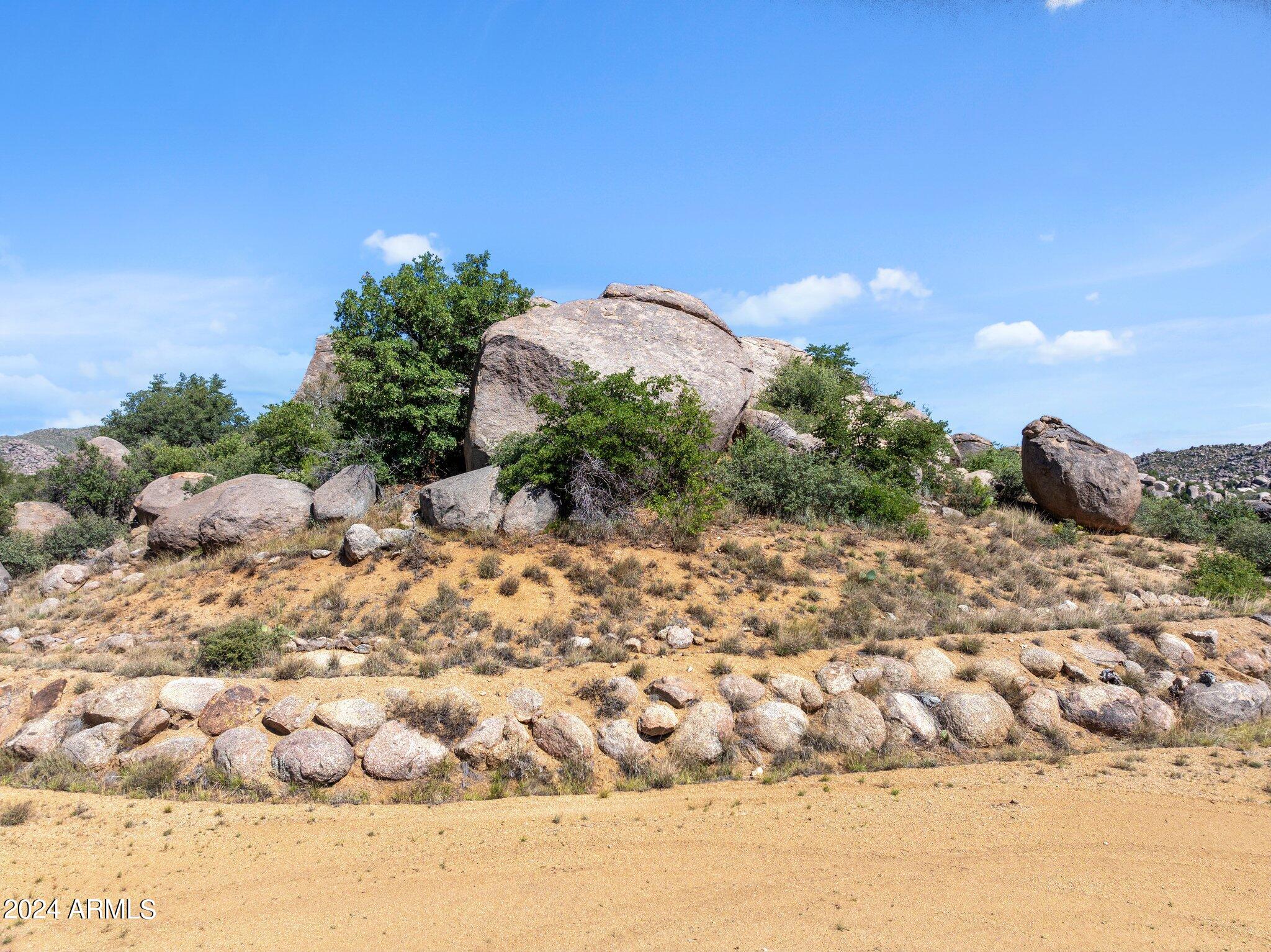This 5.90 Acres has Awesome views in every direction! A winding driveway leads you up 
to the homesite.  Yarnell offers a mild 4 season climate. Easy access to Hwy 89. Close to Shopping,restaurants,post office, library and community center.
Site built homes only CC&R'S in place.
Minutes to Wickenburg & Prescott.
