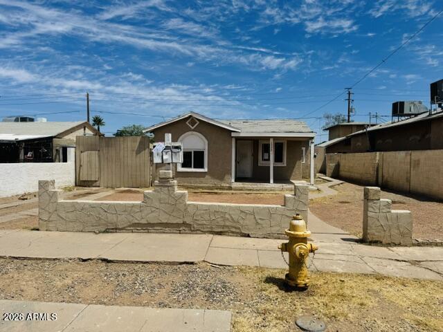 Unique multi-unit opportunity featuring three separate residences on one lot! Front home offers 3 bedrooms and 1 bathroom with spacious living areas, tile flooring and covered front patio. Second unit includes 2 bedrooms and 1 bathroom with functional kitchen and living space. Third unit features 1 bedroom and 1 bathroom, providing flexibility for rental income, extended family or multi-generational living. Convenient location near shopping, dining, schools and freeway access. Great opportunity for investors, multi-generational living or buyers seeking flexible use options with three separate residences situated on one parcel.  Buyer to verify all facts, figures, square footage and zoning/use information.