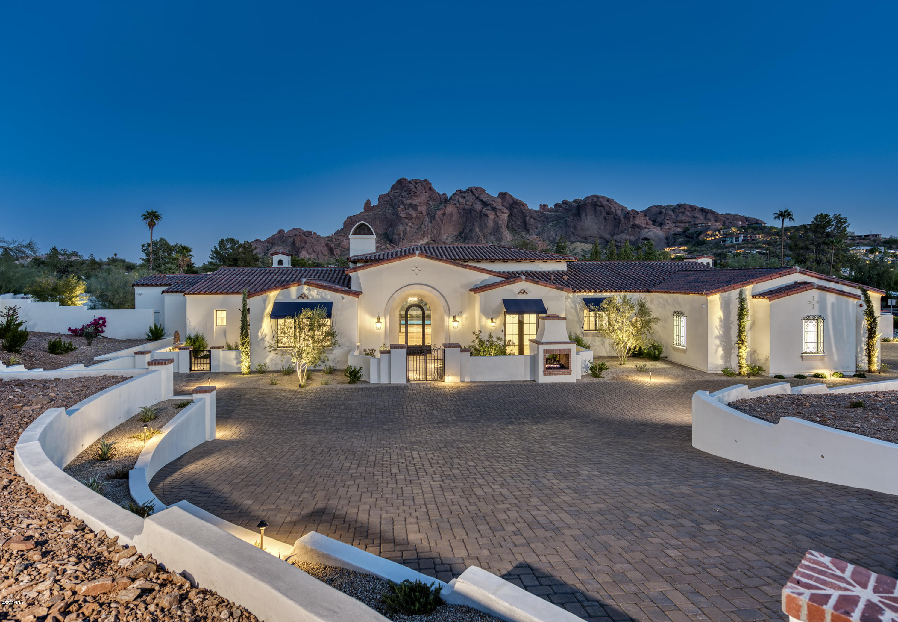 Brand New 2020 Construction. No details missed in this highly upgraded Santa Barbara inspired home. Picture frame views of Camelback Mtn from every room in the house.Thoughtfully designed single level floor plan w/ 8000 sf under roof on just over an acre. Plenty of room to add a guest house should you desire. Some of the finishes include: Wide plank European wood floors, crown molding, Arbestcato Corchia Marble throughout, top of the line Pella windows/doors, solid Alder interior doors, custom designed cabinets, Crestron indoor/outdoor lighting and surround sound, security cameras, 2 tankless hot water heaters w/ recirc pumps, groin vaulted & Bella Beam ceilings, Wolf/Sub Zero appliance package, ice maker, coffee station, Franke apron sink, designer faucets & hardware, Nest Thermostats.