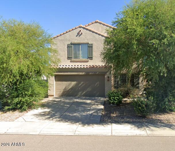 Come see this Beautiful 5 bd, 3 bth home nestled in a quiet, well-maintained neighborhood, this move-in-ready home offers the perfect blend of comfort, space, and convenience. You'll love being just minutes from schools, shopping, Fry's Marketplace, coffee shops, restaurants, parks, and everyday amenities. Step inside to discover a thoughtfully designed floor plan featuring a downstairs bedroom and full bathroom--ideal for guests, a home office, or multi-generational living. The spacious kitchen offers abundant counter space, ample cabinetry, and all ppliances, while overlooking the dining area and inviting great room, making it easy to stay connected while entertaining family and friends. Upstairs, you'll find a generous loft that provides the perfect flex space for a game room, media room, home office, study area, or relaxing retreat. The spacious primary suite features a private ensuite with dual sinks, a tub/shower combination, and a large walk-in closet. Three additional bedrooms are generously sized and share a well-appointed hall bathroom. Step outside to enjoy your private backyard with no rear neighbors, creating a peaceful setting to relax, entertain, or simply enjoy Arizona's beautiful weather. Other features include an inside laundry and a 2 car garage. With its versatile floor plan, desirable location, and move-in-ready condition, this exceptional home is one you won't want to miss.