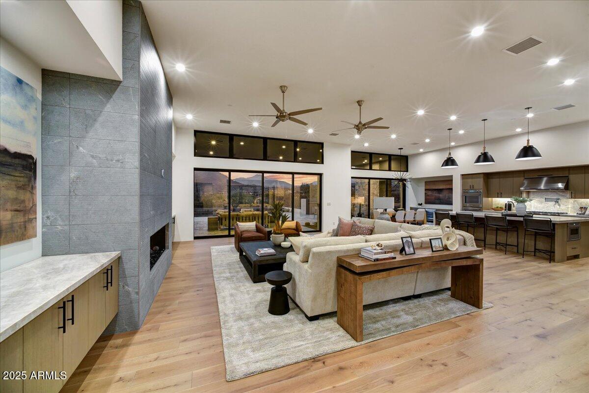 Brand new Mortensen Signature Home. Outstanding Mountain and Sunset Views. Easy access to the main gate. Cul-de-sac location. Dual Primary Suites, 2 other
 en-suite bedrooms plus an office, den or 5th bedroom, take your pick. 4 Sliding door exits to your view patio with pool, spa, oversize fireplace and bbq ready for relaxation and entertainment. Desert Mountain builder golf membership  is available  with Desert Mountain club approval. Whole Home Furniture packages available.