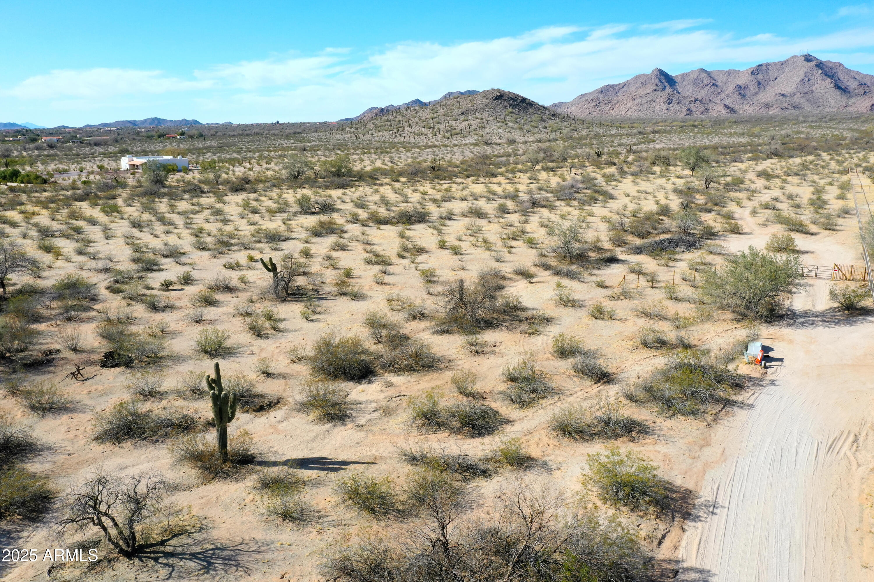 Unbelievable views from the 4 acre lot in the foothills of Casa Grande.  Custom homes area with large acreage parcels giving much privacy.  Very quiet setting with breathtaking sun sets and sun rises.  Build our dream home here and enjoy the serene desert with starry nights.   Arizona water to the lot line and San Carlos Electric to the lot line also.