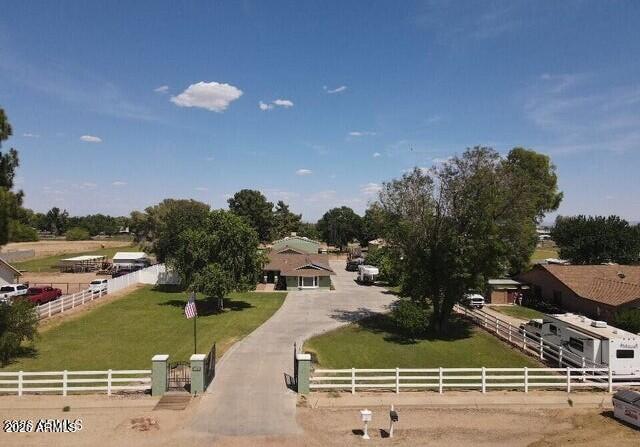 Beautifully maintained horse property with two master bedrooms on 2 flood irrigated acres with mature trees, Built in BBQ, white 3-rail vinyl fencing, electric gate, and privacy fencing around the backyard. Features include a 35'x35' RV garage/shop with a swamp cooler, climate-controlled 2-car garage, 5-year-old roof, and 8-month-old HVAC system. The home offers two master bedrooms, granite countertops, newer appliances, fireplace, and views of the sparkling pool with climate-controlled pool house, new variable speed pool pump, and new cartridge filter. Equestrian setup includes a 6-stall barn with auto waterers, arena, dry lot, 11'x15' tack room, and grain bin for feed storage. Recent appraisal completed for added confidence and value. This home has Grandfathered NetMetering Solar as well Experience the perfect blend of comfort, functionality, and country living on this beautifully maintained property featuring two flood irrigated acres designed for both relaxation and equestrian enjoyment. Surrounded by mature trees and enclosed with attractive 3-rail white vinyl fencing, this exceptional property offers privacy, convenience, and room to roam, complete with an electric front gate and white vinyl privacy fencing around the yard area.

The home features granite countertops, newer appliances, a cozy fireplace, and thoughtfully updated systems for peace of mind, including a 5-year-old roof and an 8-month-old HVAC system. Step outside to enjoy the sparkling pool with a new variable speed pool pump and new cartridge pool filter, along with a climate-controlled pool house perfect for entertaining, hobbies, or additional flex space.

Car enthusiasts, hobbyists, and RV owners will appreciate the impressive 35'x35' RV garage/shop complete with insulation and a swamp cooler, as well as the insulated and climate-controlled two-car garage.

Equestrian amenities are already in place and ready to go, including a 6-stall horse barn with automatic waterers, dry lot, arena, 11'x15' tack room/shed, and grain bin for feed storage.

This well-cared-for property combines modern updates, exceptional outbuildings, and horse facilities in a serene setting. A recent appraisal has already been completed, adding confidence and value for prospective buyers.