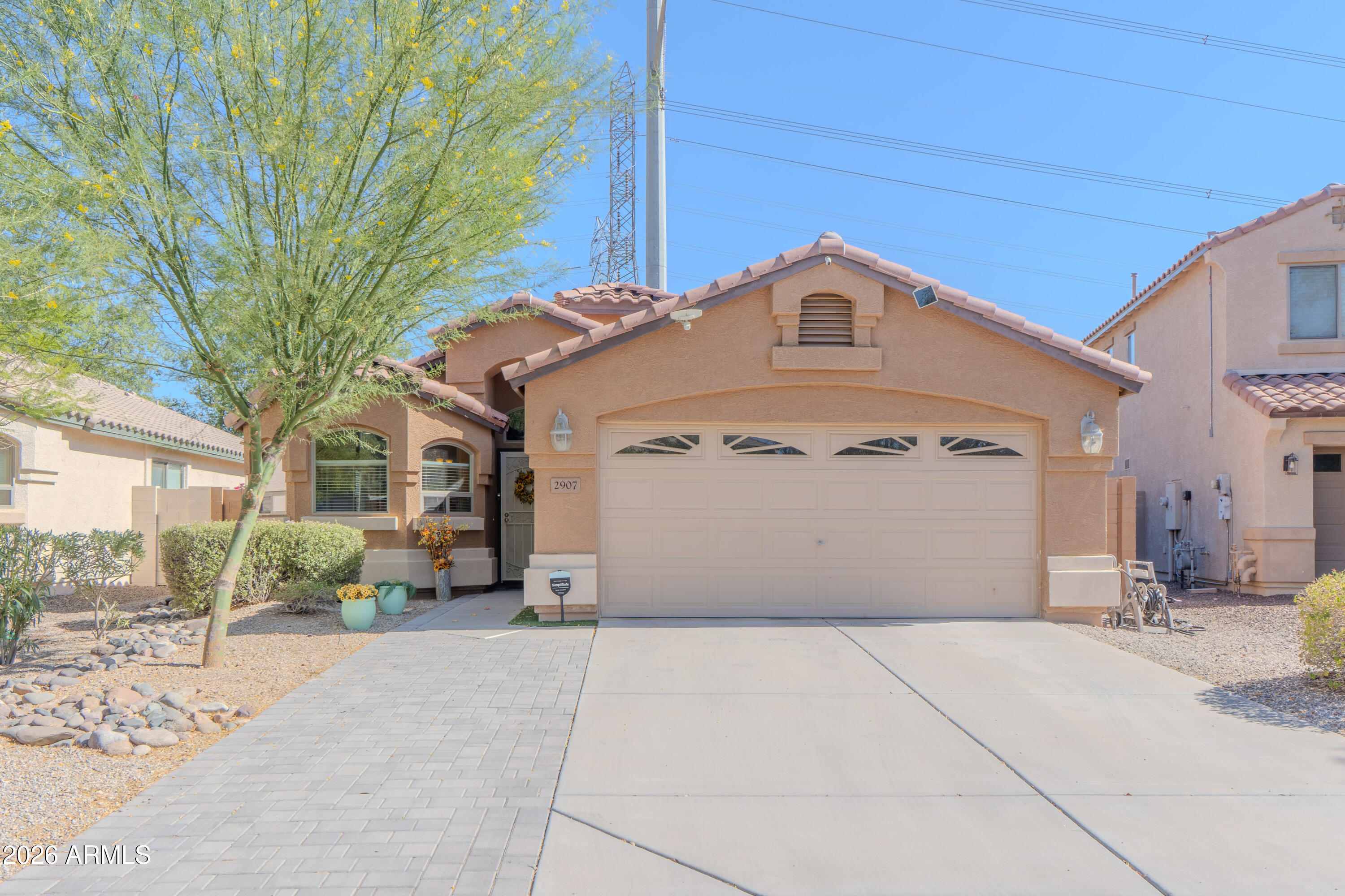 You've been looking in North Phoenix and keep getting out-priced or outcompeted, this is the one to pay attention to. Four bedrooms, two baths, 1,830 square feet in Desert Peak, one of the better pockets in the 85024 zip code. You're in the Paradise Valley Unified School District, a few minutes from the Loop 101 and SR-51, and close enough to Desert Ridge that dinner and groceries aren't an event. The neighborhood has walking and biking paths, a playground, and open space behind the home. It doesn't feel like a cookie-cutter subdivision. Built in 2008, single story, open floor plan. This is a solid, well-located home at a price point that makes sense. Homes in this area don't sit long when they're priced right... and this one is.