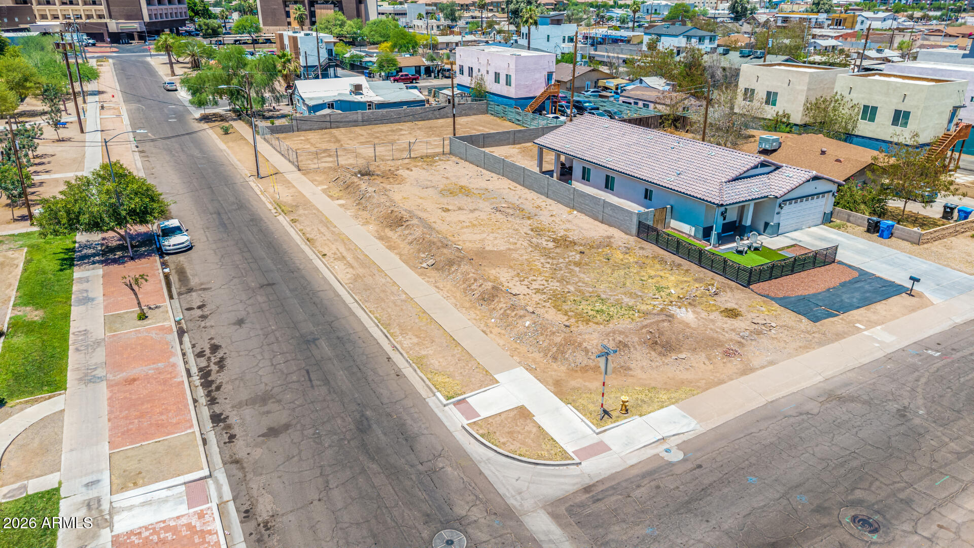 **Exceptional Development Opportunity near the Heart of Downtown Phoenix!** This prime corner lot, located at W Yavapai Street and S Montezuma Ave, offers outstanding potential in one of Phoenix's most desirable urban locations. Positioned directly across from a beautiful neighborhood park, this R-4 zoned parcel provides flexibility for both single-family and multi-family residential development. Surrounded by the energy and convenience of downtown living, this rare vacant lot presents an excellent opportunity for builders, investors, or those looking to create a custom residential project. Don't miss your chance to secure a versatile property in a thriving and highly sought-after area.