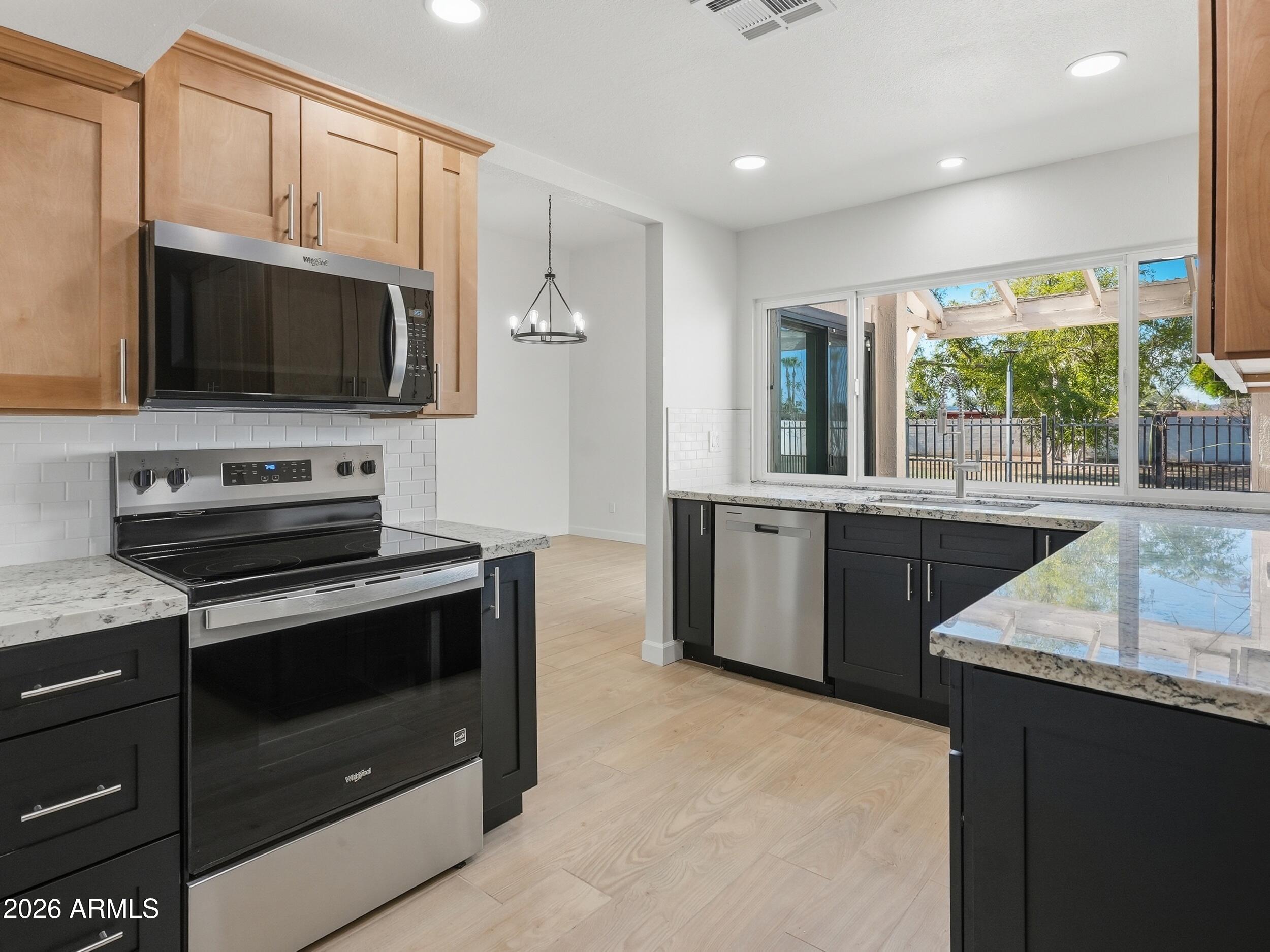 Welcome to 326 E. Huntington Dr., Tempe, AZ 85282, a beautifully renovated, move-in ready townhome that perfectly blends modern updates with comfort, style, and convenience. Thoughtfully updated with today's buyer in mind, this turnkey property features tasteful finishes, an inviting floor plan, and spacious living areas designed for both everyday living and entertaining. Enjoy peaceful mornings and relaxing evenings on the private patio, which backs to a beautifully landscaped community green space, creating a serene extension of your backyard. Nestled in a quiet, well-maintained subdivision, this home offers the ideal balance of privacy and accessibility. Location is everything, & this home delivers. Situated in the heart of Tempe, you'll be just minutes from Arizona State University Tempe Marketplace, Mill Avenue, Sloan Park, and the scenic trails and recreation at Tempe Town Lake. Commuters will appreciate quick access to Loop 101, Loop 202, US-60, and I-10, making travel throughout the Valley effortless. The area is also known for its vibrant dining scene, entertainment, shopping, and year-round community events.

Whether you're a first-time homebuyer, investor, professional, or someone looking to downsize without compromising on quality, this exceptional townhome offers low-maintenance living in one of the Valley's most desirable locations. Stylish, updated, and truly move-in ready, this is a home you'll be proud to own.