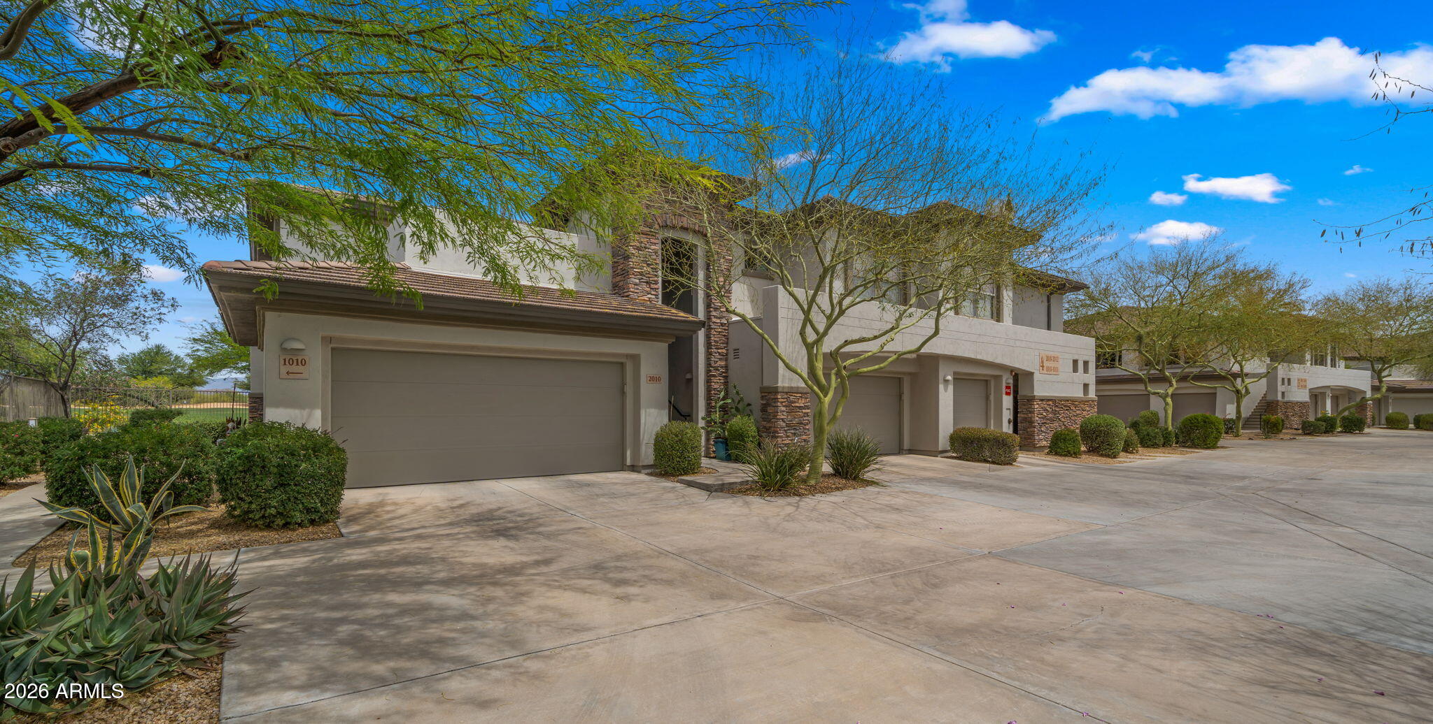 Set along the 18th hole of Dove Valley Ranch Golf Club, this beautifully upgraded 3bed/2bath condo offers over 1,800 square feet of light filled living with sweeping golf course and mountain views at every turn. Designed for both comfort and style, the open-concept layout creates a seamless flow between living, dining, and entertaining spaces. The spacious primary suite serves as a true retreat, featuring a generous walk in closet and a spa-inspired ensuite bath. The kitchen is thoughtfully appointed with granite countertops, stainless steel appliances, and ample space for cooking and gathering. Expansive windows throughout the home frame breathtaking fairway and desert mountain vistas, creating a serene, resort style setting that elevates everyday living.
