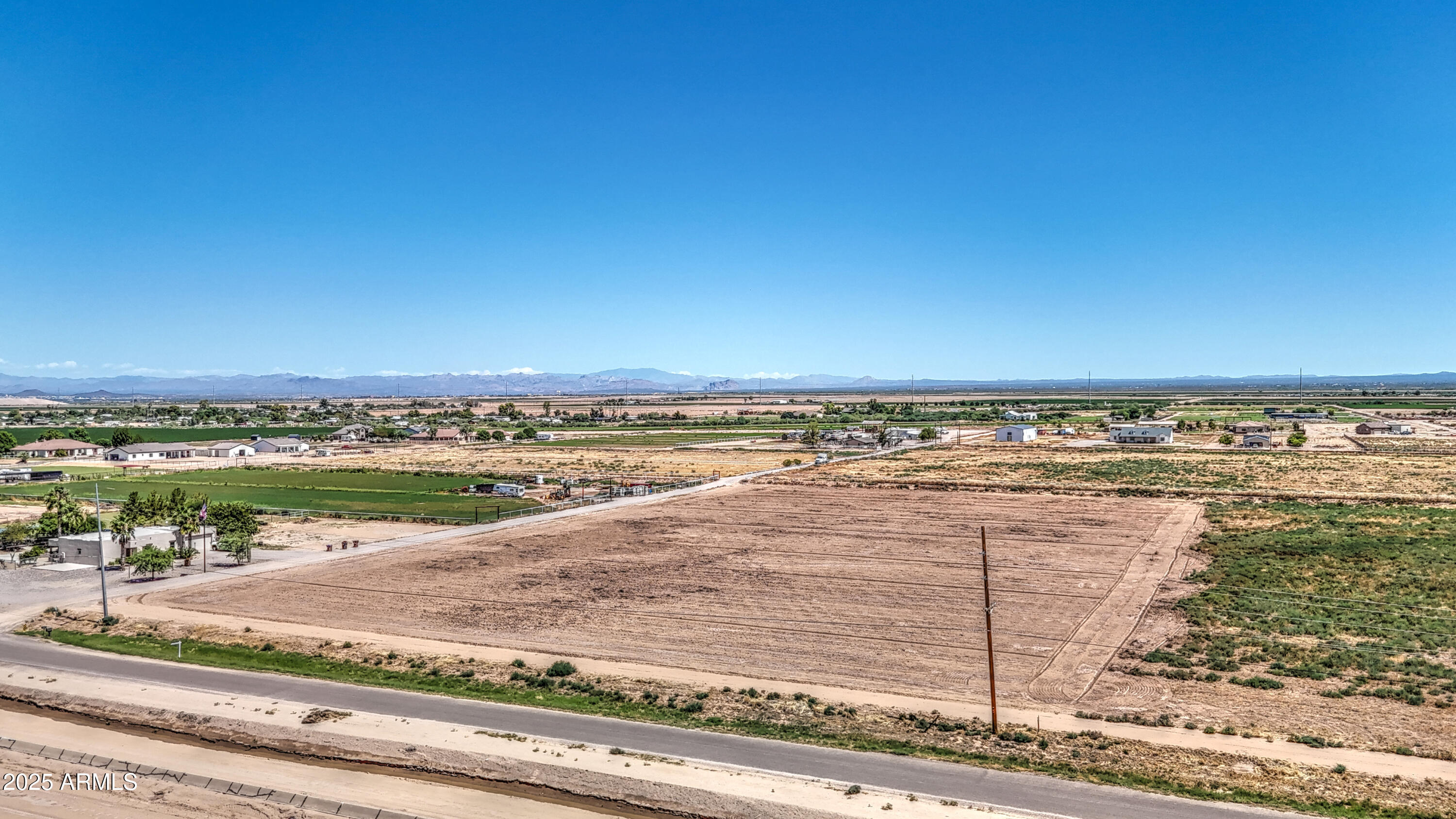 Discover the perfect opportunity to build your dream home on this expansive 1.5-acre parcel, offering ample space for a custom build with breathtaking views of Valley Farms. Nestled in a serene yet convenient location, this property provides easy access to essential utilities, including electrical service and a water pipe tie-in with Arizona Water Company, making the development process smooth and cost-effective.
With plenty of room for a spacious home, guest casita, workshop, or equestrian setup, this lot offers flexibility for various lifestyle needs. Enjoy the tranquility of wide-open spaces while remaining close to modern conveniences, shopping, dining, and major roadways.
Don't miss out on this rare find—a build-ready lot with the infrastructure to support your vision.