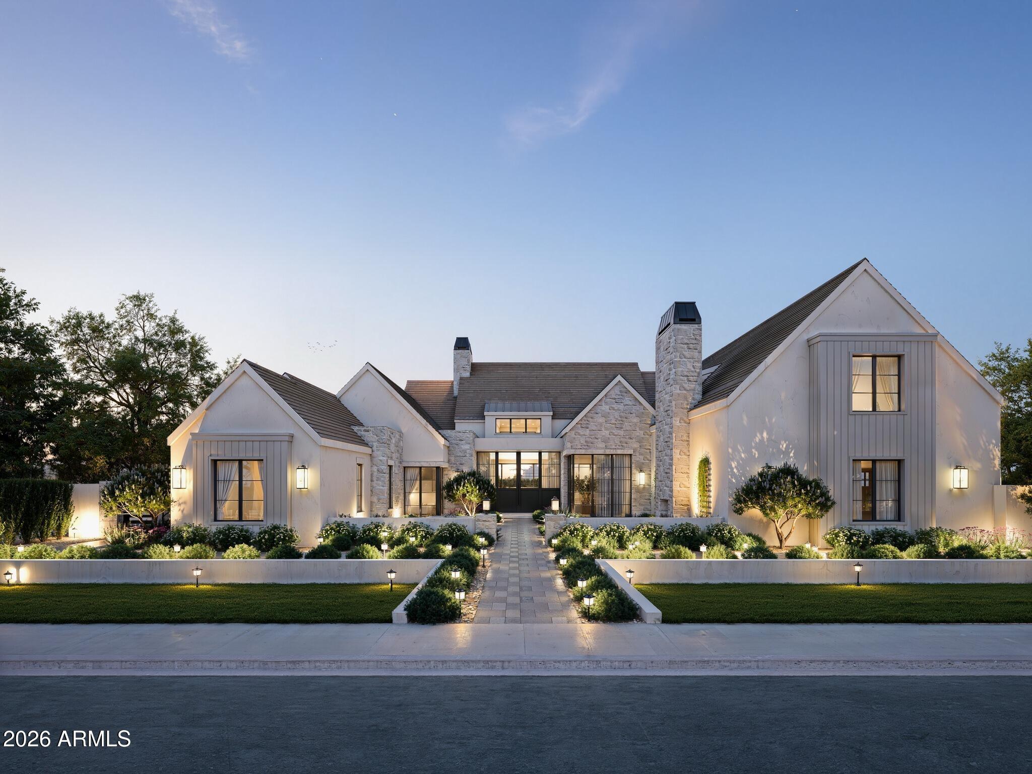 Nestled within Gilbert's private Somerset community, this Modern Transitional estate blends bright organic interiors with timeless architectural design across 6,990 square feet of thoughtfully curated living space. Offering 5 bedrooms, 6.5 bathrooms, a 4-car garage, and expansive indoor-outdoor living, the home was designed to balance elevated entertaining with everyday comfort.

The main living spaces flow effortlessly between the great room, kitchen, dining area, and outdoor entertaining spaces, creating a warm and inviting atmosphere throughout. The kitchen is designed as both a focal point and gathering place, featuring an oversized island, custom cabinetry, and premium appliances. Additional spaces including a formal dining room, private office, and dedicated movie room add both functionality and flexibility to the overall layout.

The primary suite serves as a quiet retreat with a refined spa-like bathroom, oversized walk-in closet, and direct access to the backyard. Upstairs, additional ensuite bedrooms and flexible living spaces continue the home's cohesive design and livability.

Designed for year-round Arizona living, the backyard offers a resort-style pool, expansive patio spaces, and a private pickleball court surrounded by mature landscaping and generous outdoor entertaining areas.

Brought to life by Carder Construction, with architecture by Grady Olsen Design and interiors by The Lifestyled Co., this residence delivers a fresh and design-forward interpretation of Modern Transitional living within one of Gilbert's most sought-after gated communities.